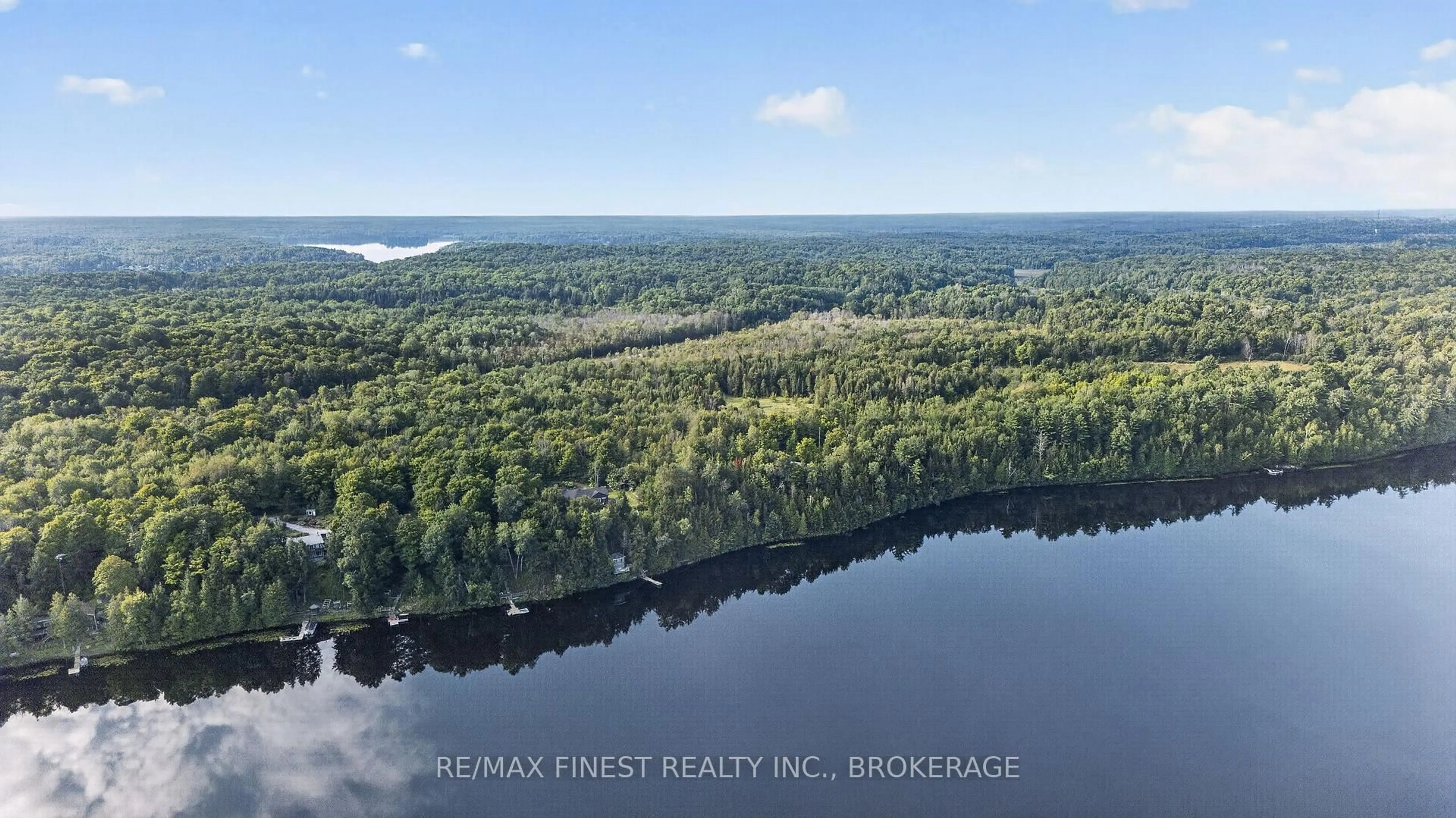 A pic from outside/outdoor area/front of a property/back of a property/a pic from drone, water/lake/river/ocean view for 1068 Pleasant Hill Lane, Arden Ontario K0H 1B0