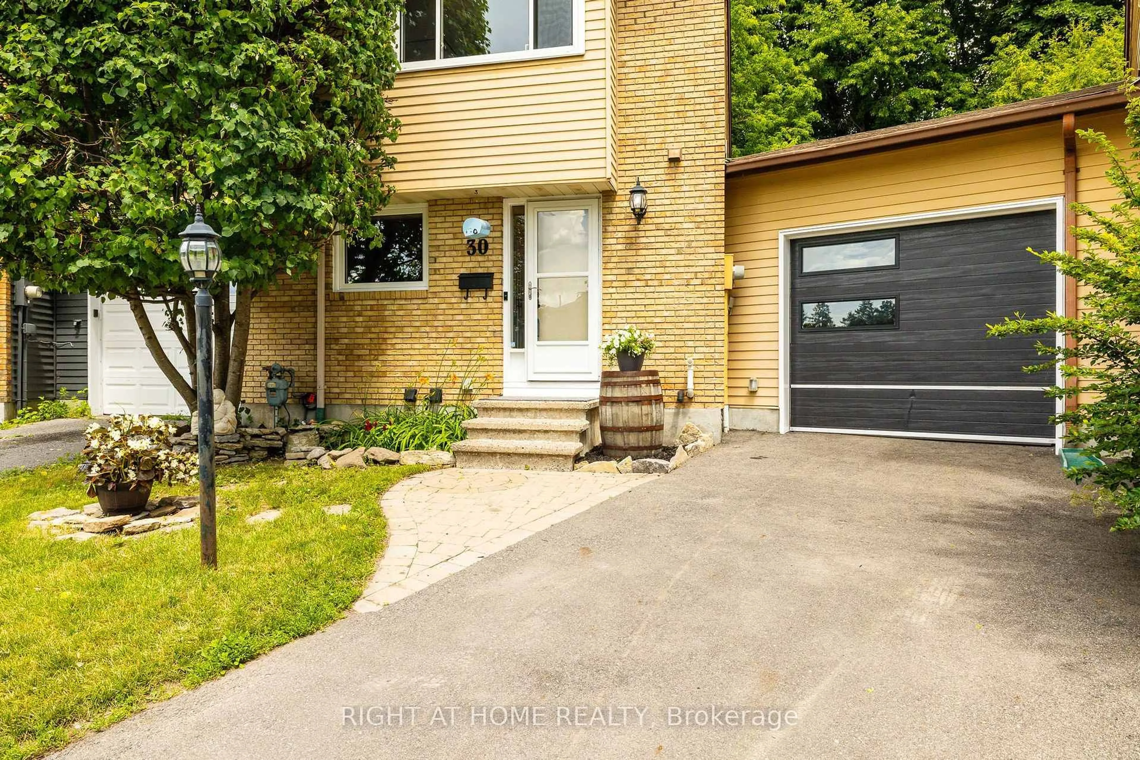 Home with brick exterior material, street for 30 Berkshire Way, Barrhaven Ontario K2J 2B2