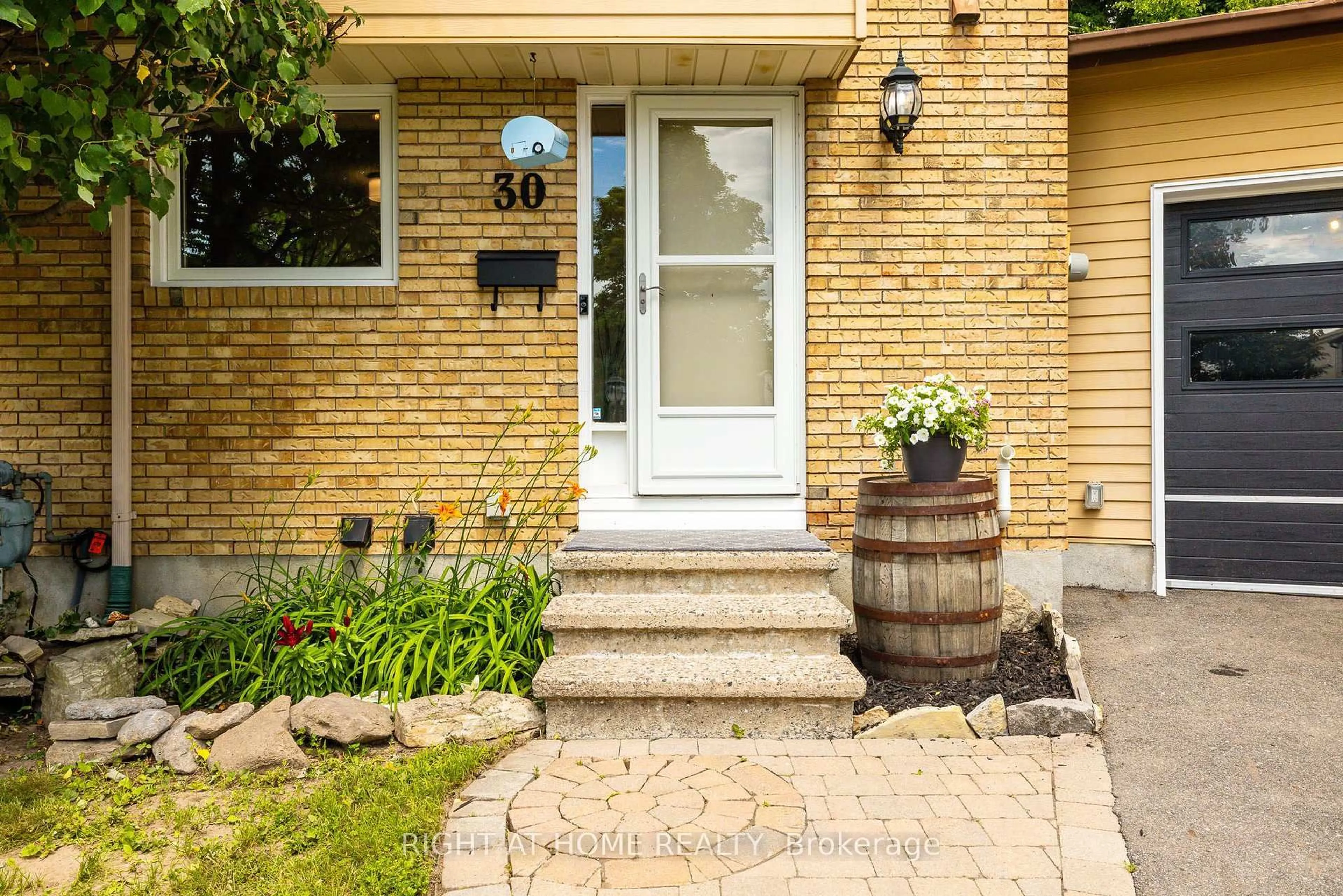 Home with brick exterior material, street for 30 Berkshire Way, Barrhaven Ontario K2J 2B2
