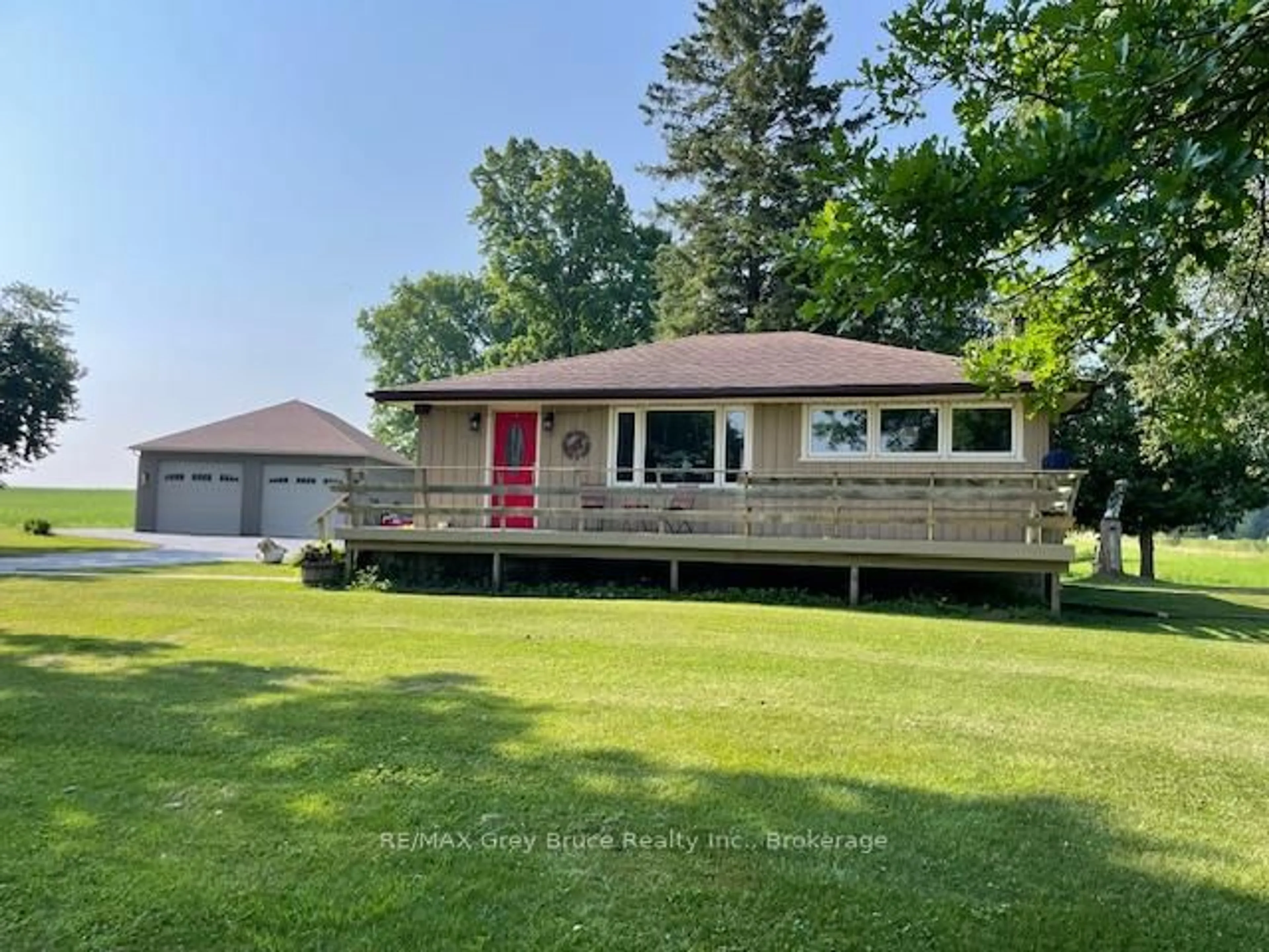 A pic from outside/outdoor area/front of a property/back of a property/a pic from drone, water/lake/river/ocean view for 202306 6 Highway, Georgian Bluffs Ontario N4K 5N5