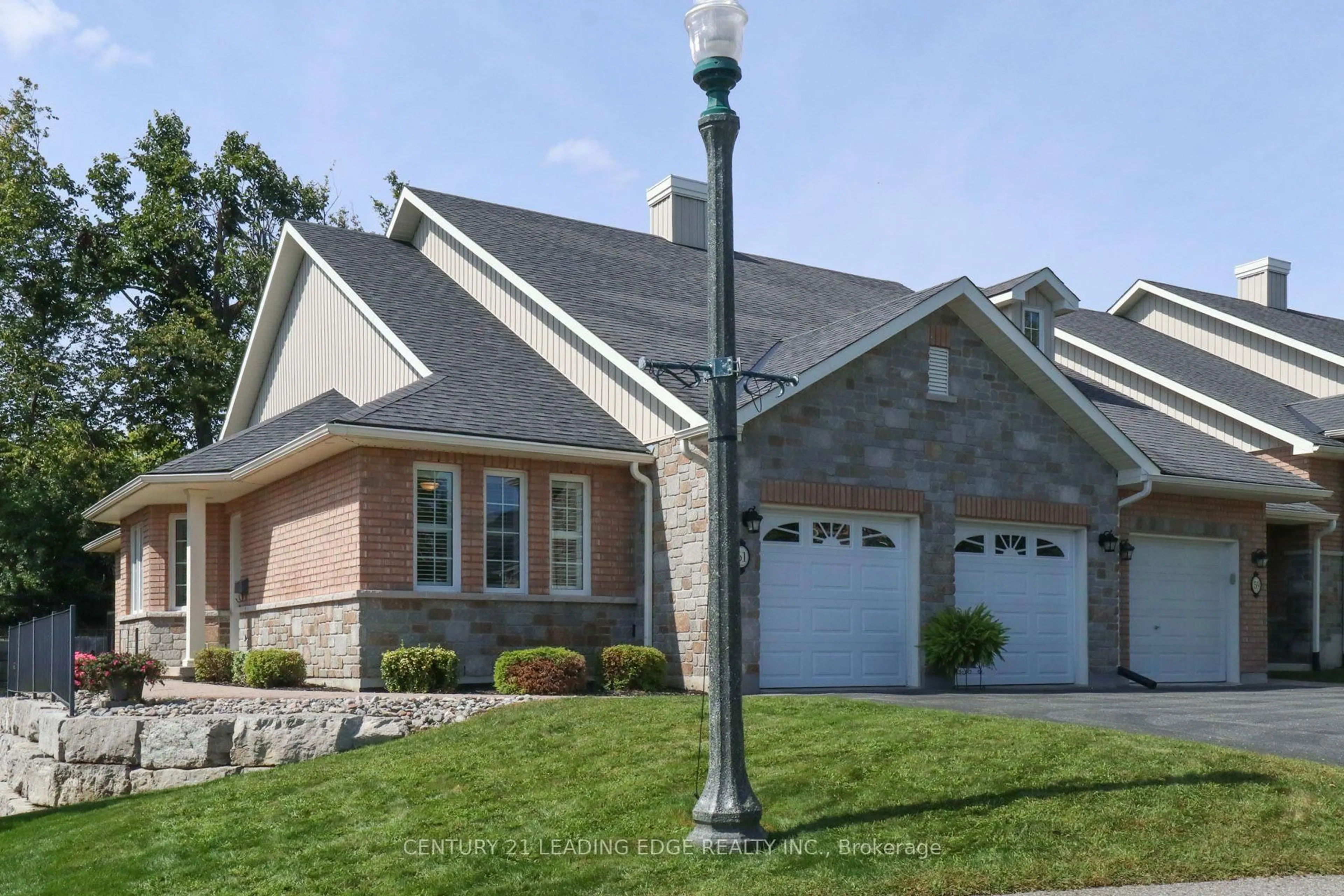 Home with brick exterior material, street for 61 Village Cres #100, Peterborough Ontario K9J 0A9