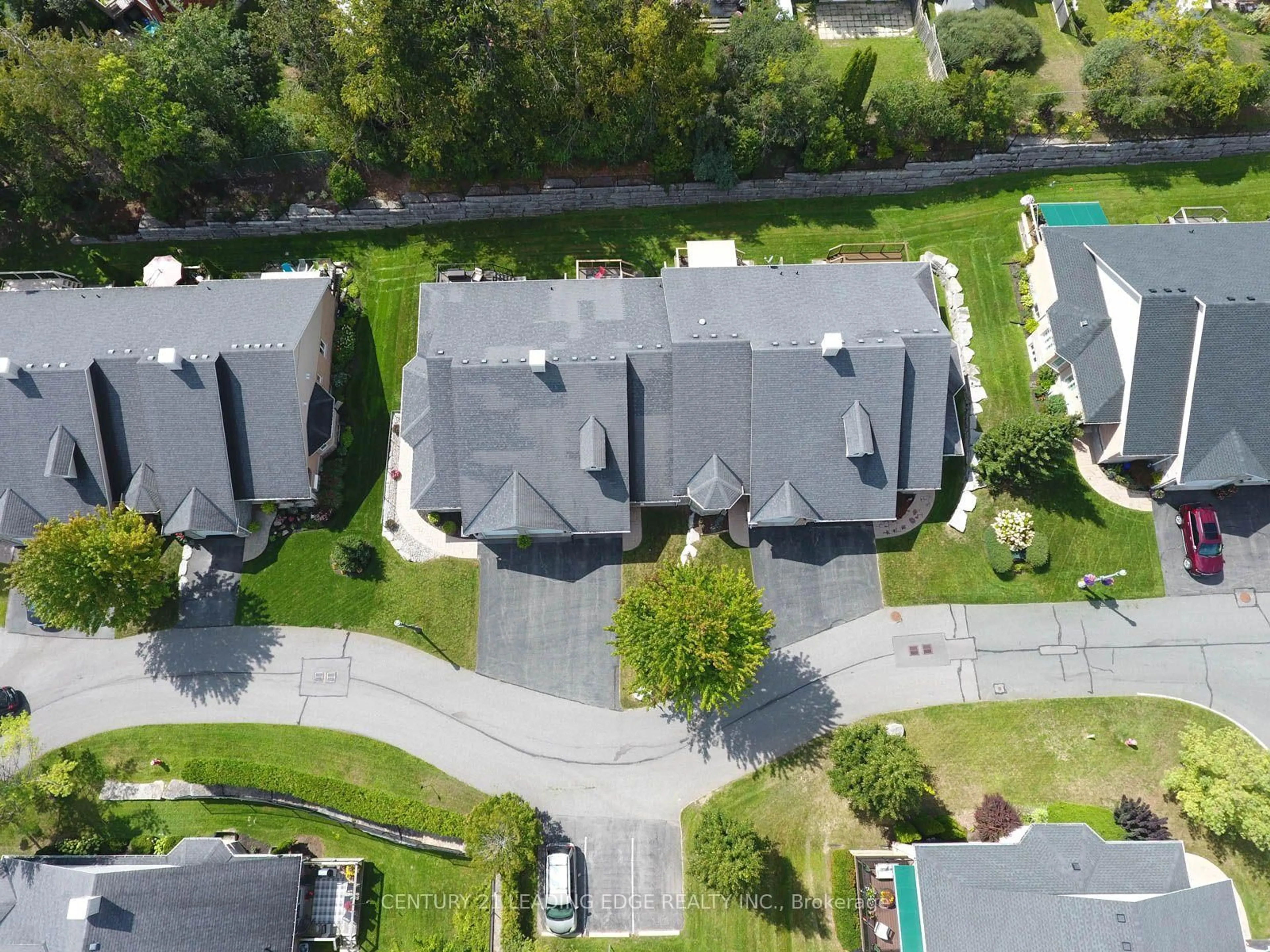 A pic from outside/outdoor area/front of a property/back of a property/a pic from drone, street for 61 Village Cres #100, Peterborough Ontario K9J 0A9