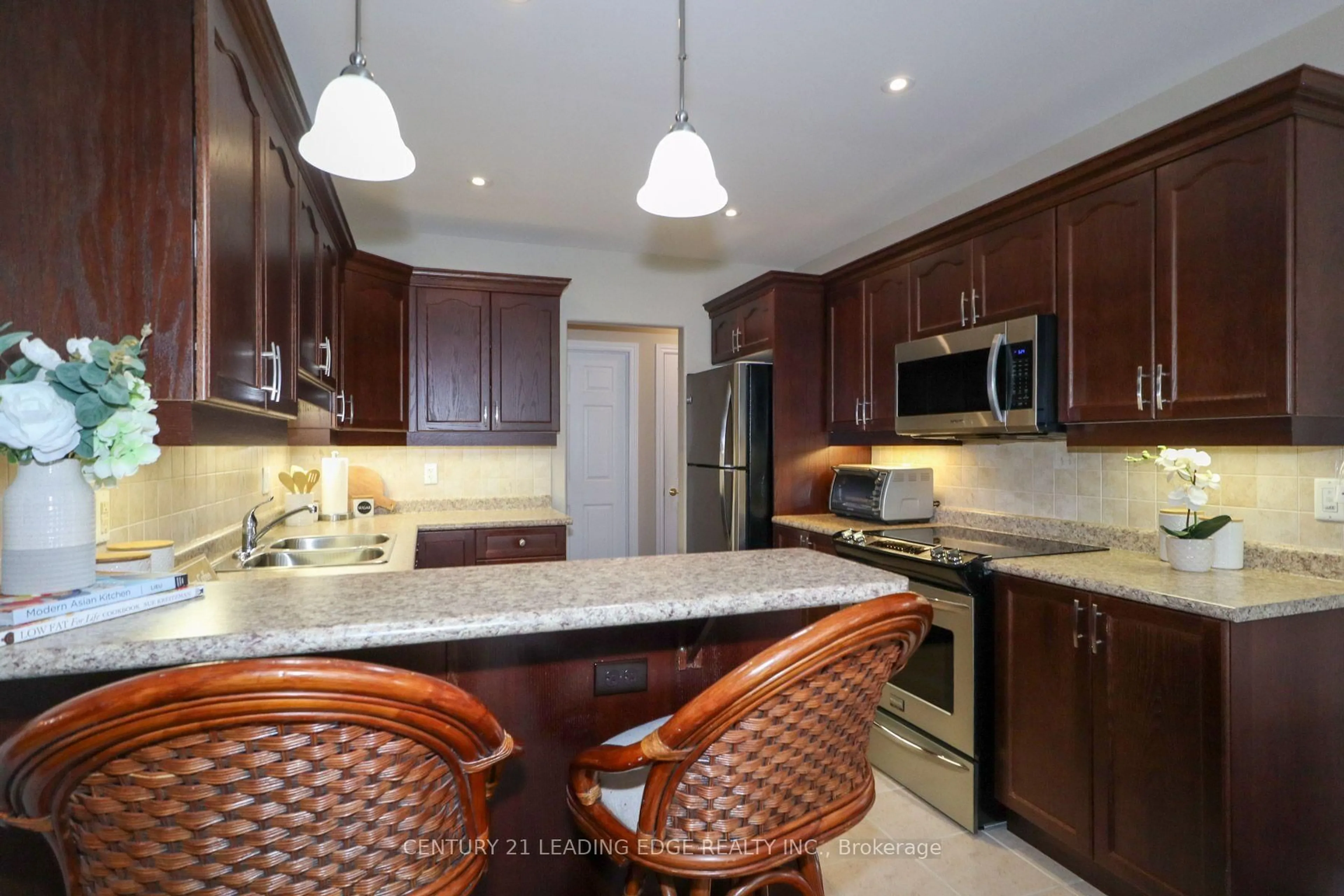 Open concept kitchen, ceramic/tile floor for 61 Village Cres #100, Peterborough Ontario K9J 0A9