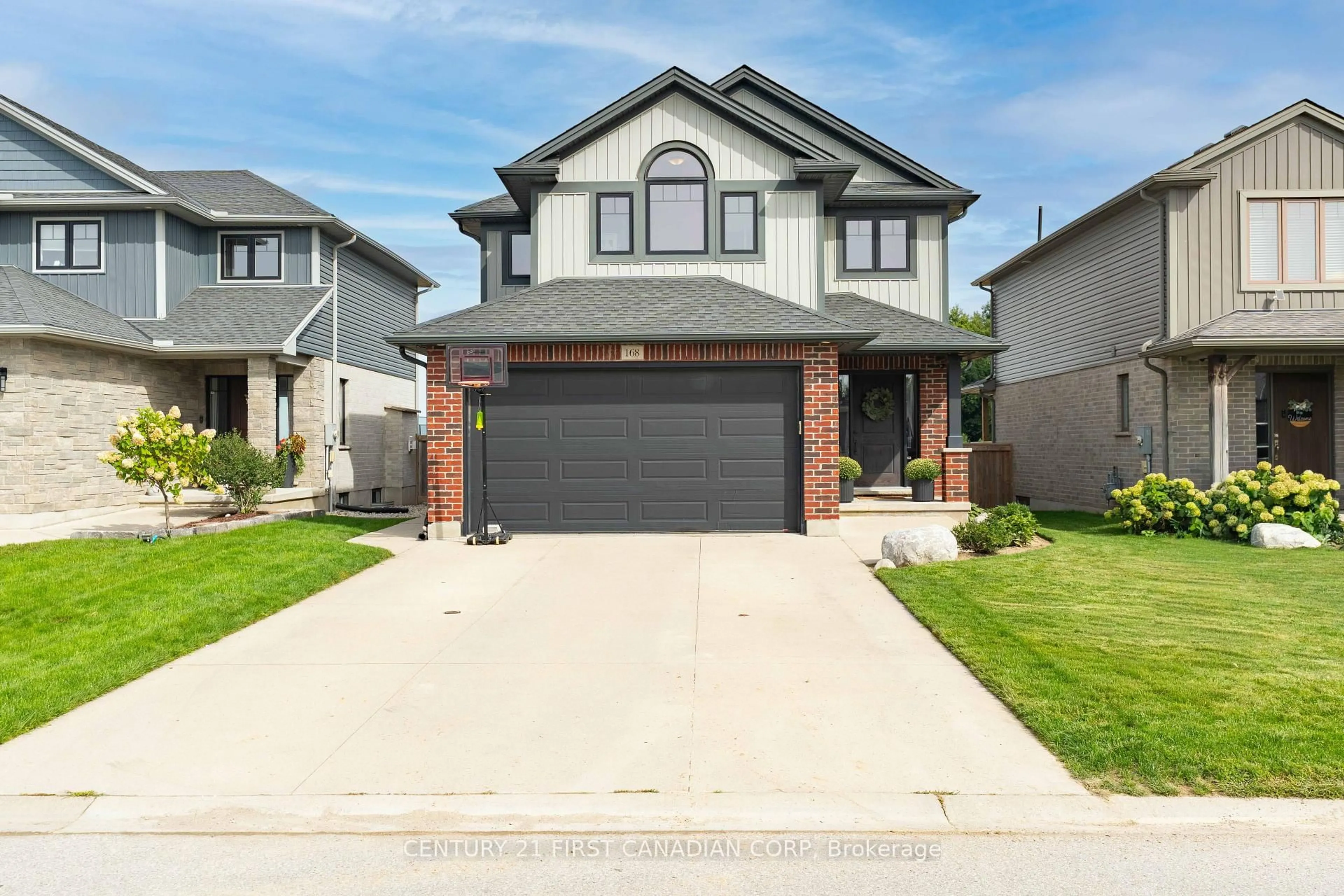 Home with brick exterior material, street for 168 Gilmour Dr, Lucan Biddulph Ontario N0M 2J0