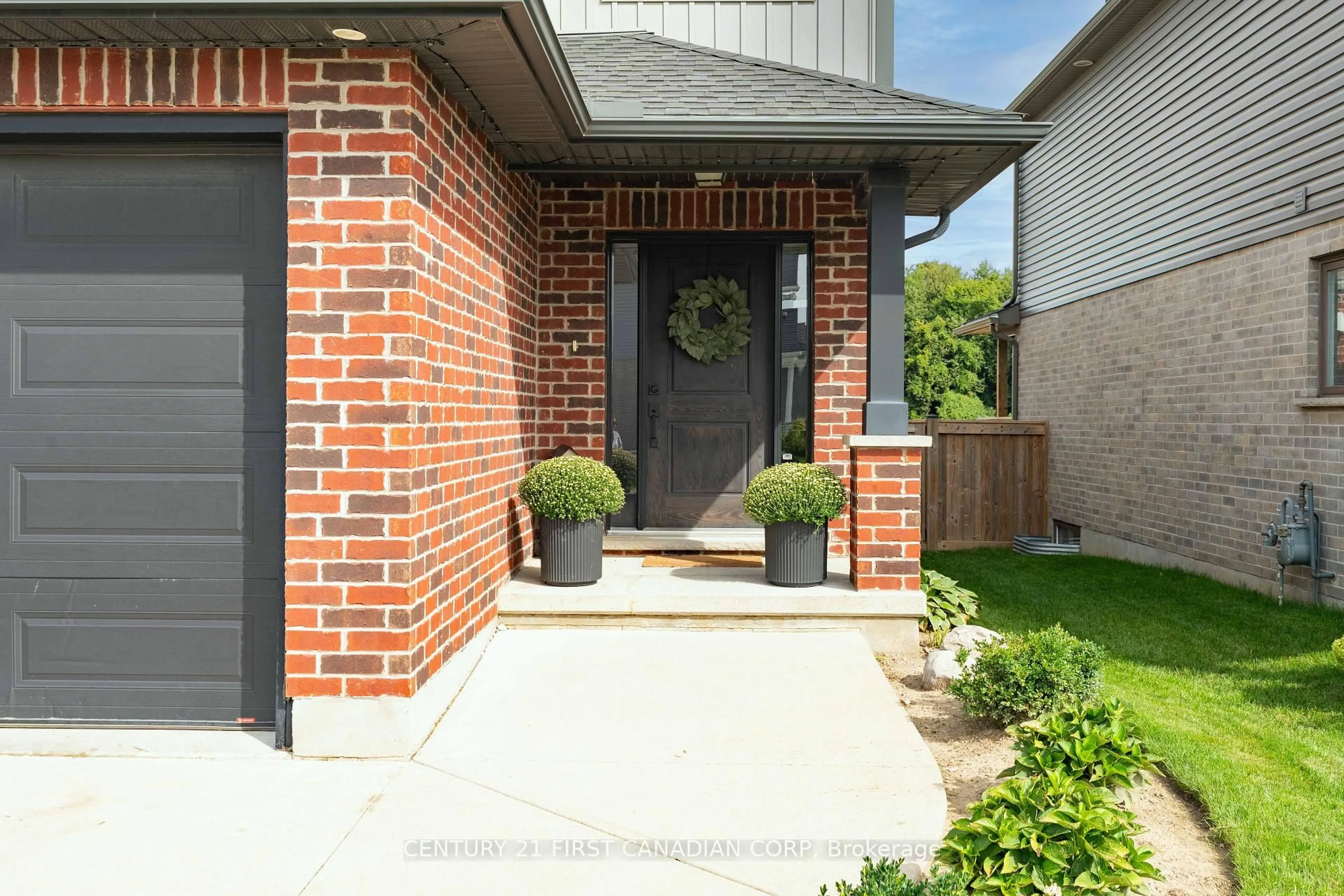 Home with brick exterior material, street for 168 Gilmour Dr, Lucan Biddulph Ontario N0M 2J0
