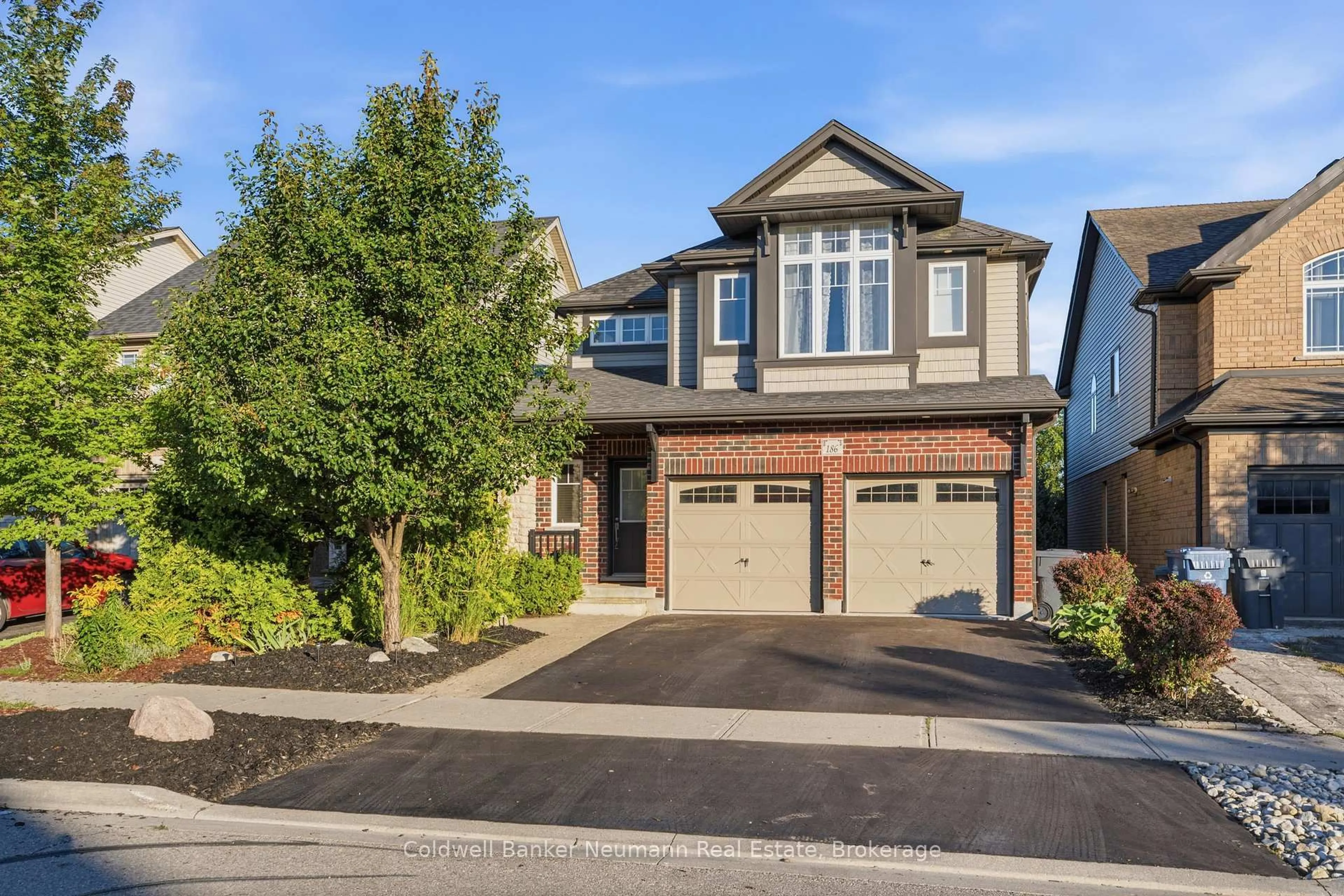 Home with brick exterior material, street for 186 Goodwin Dr, Guelph Ontario N1L 0C7