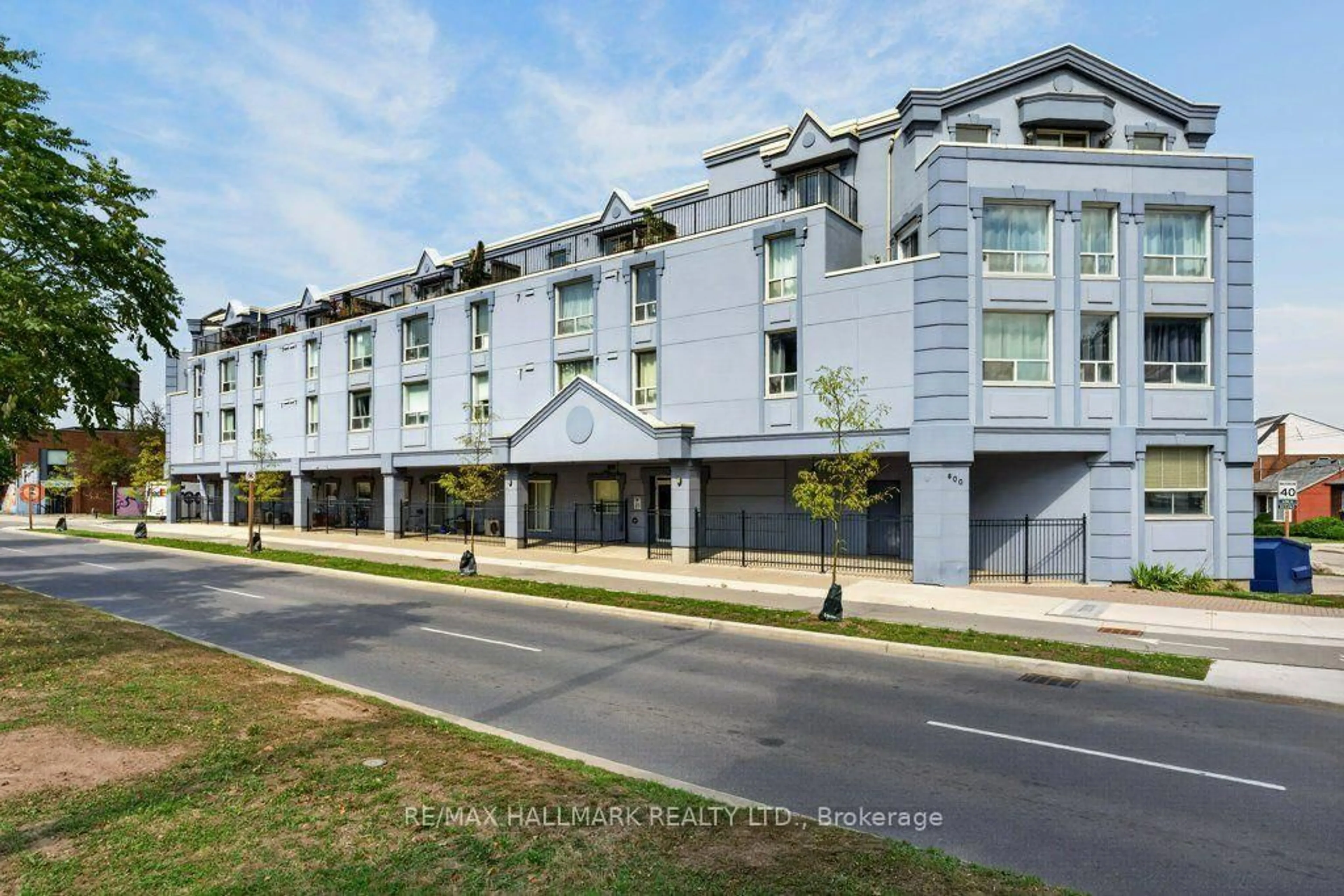 A pic from outside/outdoor area/front of a property/back of a property/a pic from drone, unknown for 400 York Blvd #203, Hamilton Ontario L8R 3M5