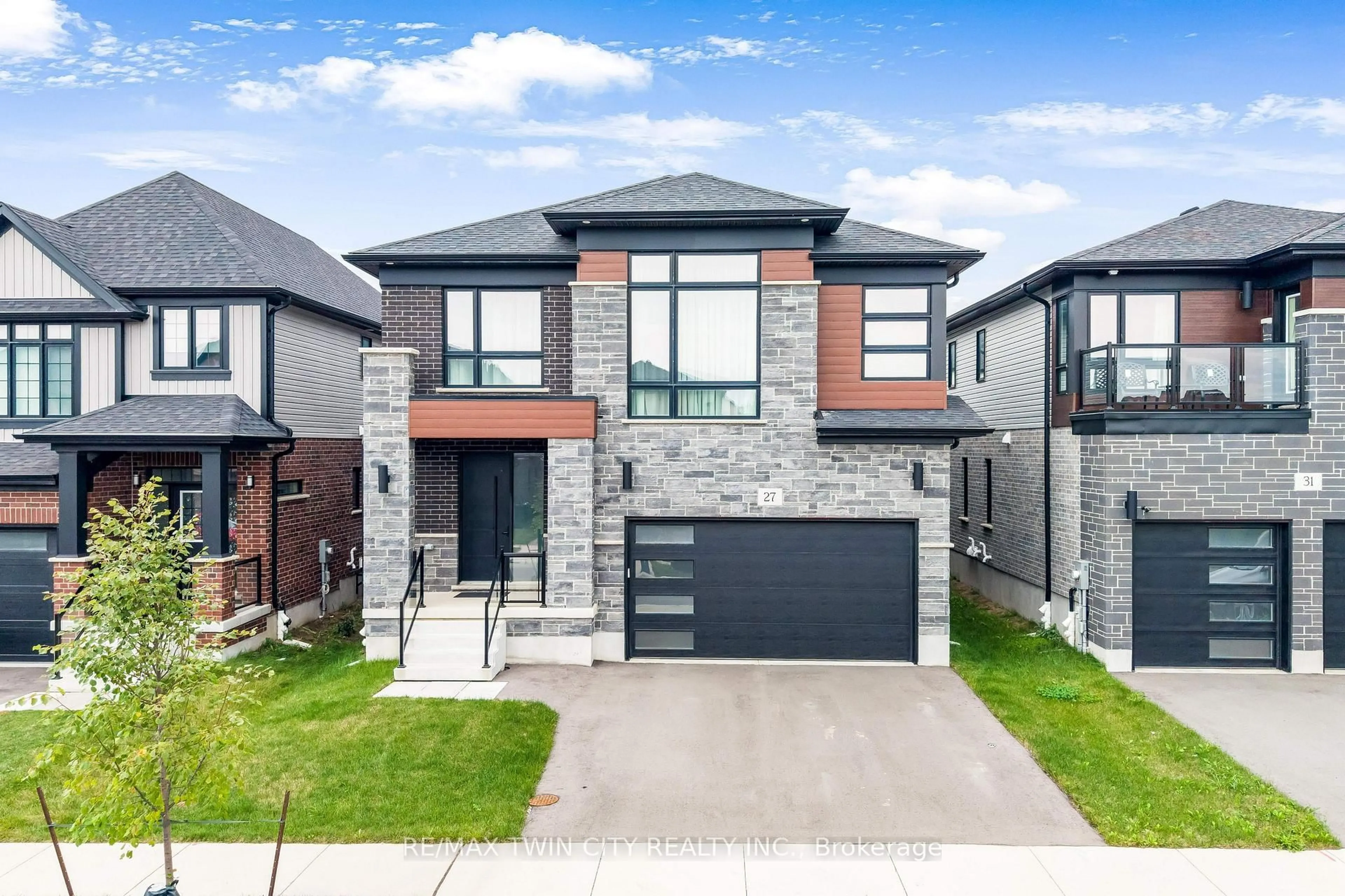 Home with brick exterior material, street for 27 Jacob Detweiller Dr, Kitchener Ontario N2P 0K7