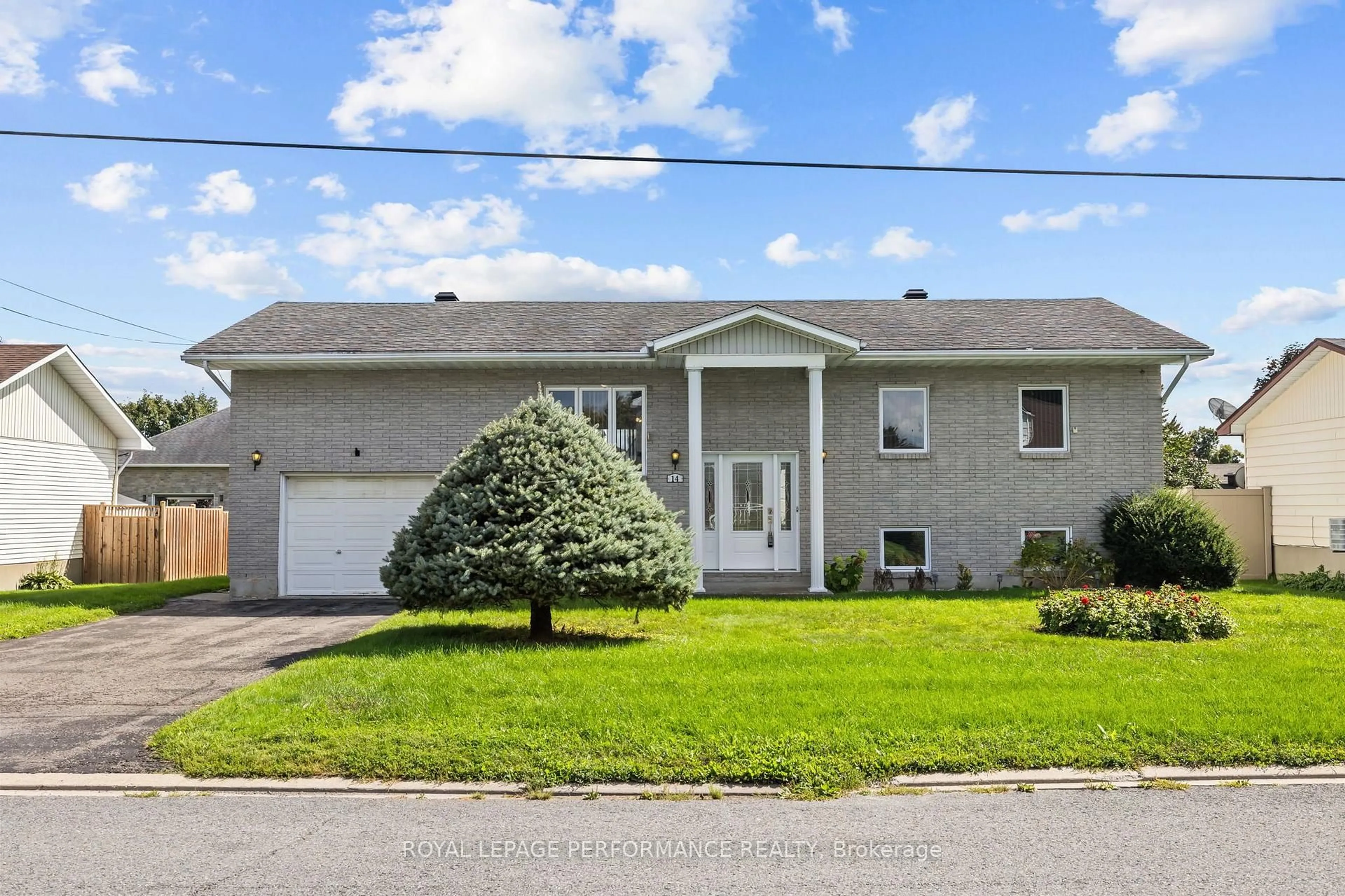 Home with vinyl exterior material, street for 14 Albert St, Casselman Ontario K0A 1M0