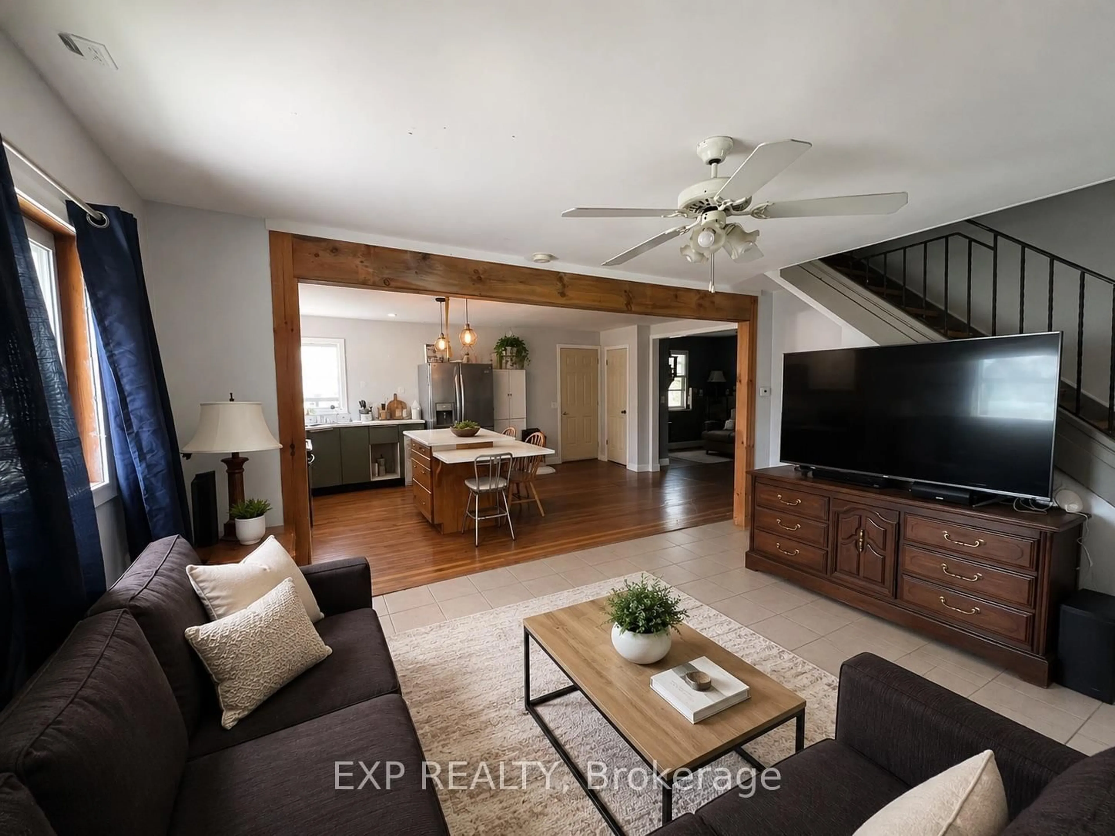 Living room with furniture, wood/laminate floor for 155 North St, Southwest Middlesex Ontario N0L 1M0