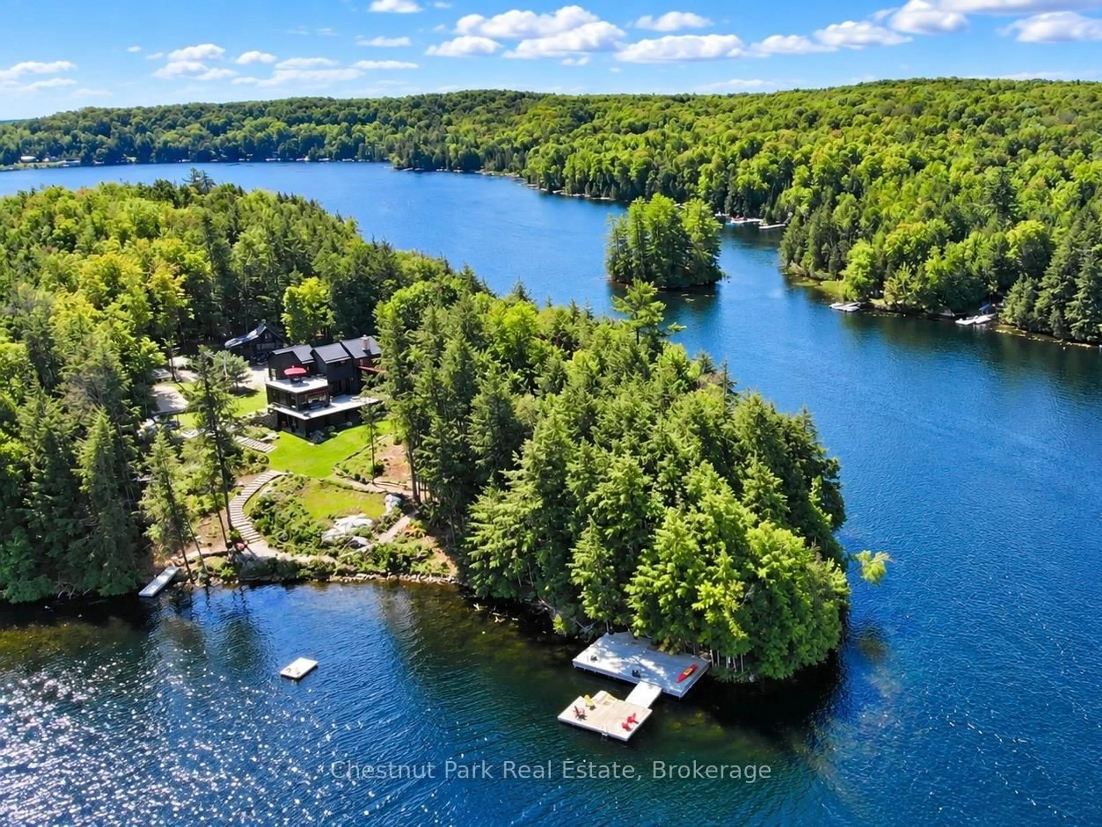 A pic from outside/outdoor area/front of a property/back of a property/a pic from drone, water/lake/river/ocean view for 1304 Grandpa's Tr, Highlands East Ontario K0M 2K0