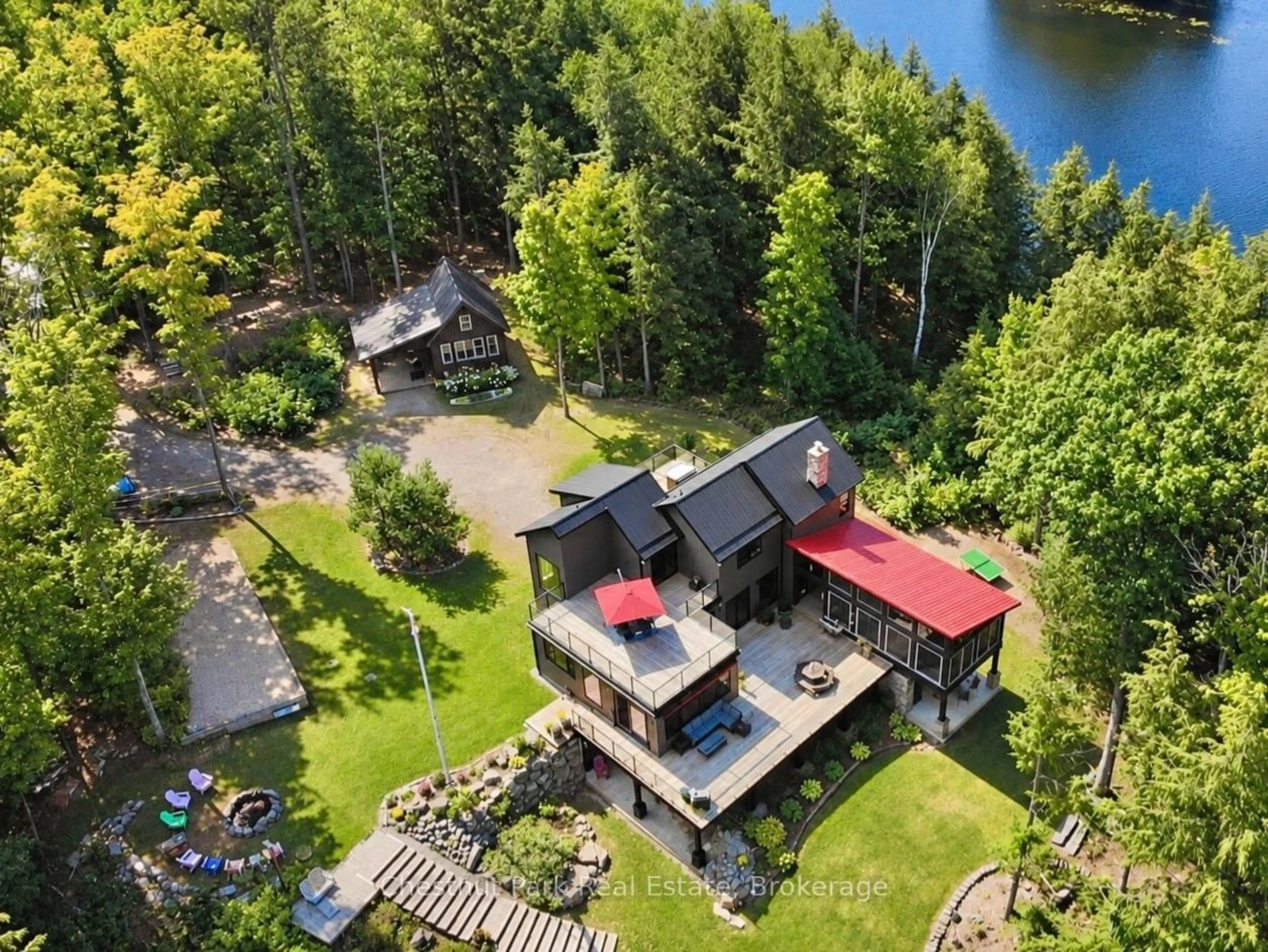 A pic from outside/outdoor area/front of a property/back of a property/a pic from drone, water/lake/river/ocean view for 1304 Grandpa's Tr, Highlands East Ontario K0M 2K0