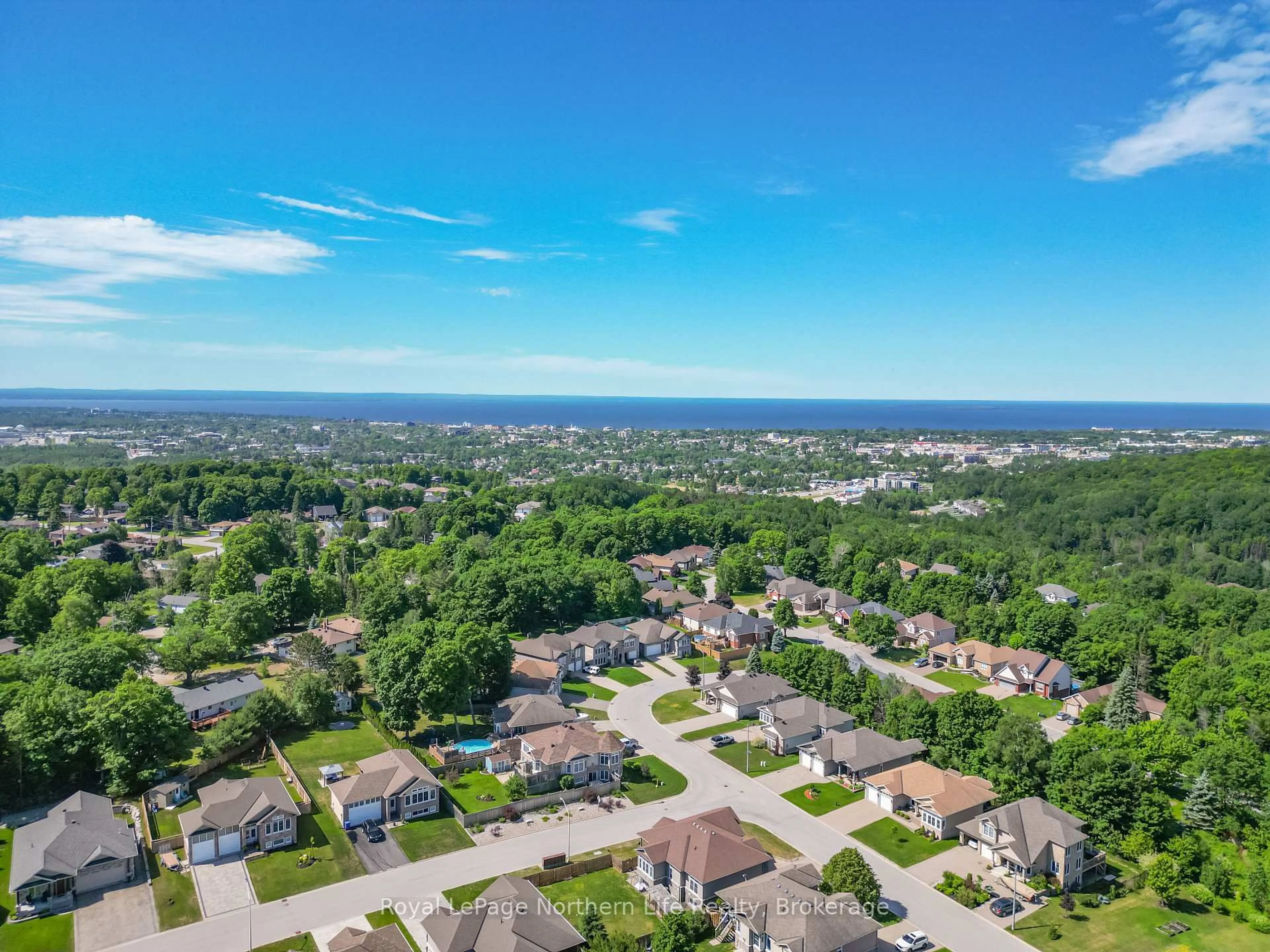 A pic from outside/outdoor area/front of a property/back of a property/a pic from drone, unknown for 9 Silver Maple Lane, North Bay Ontario P1C 0B5