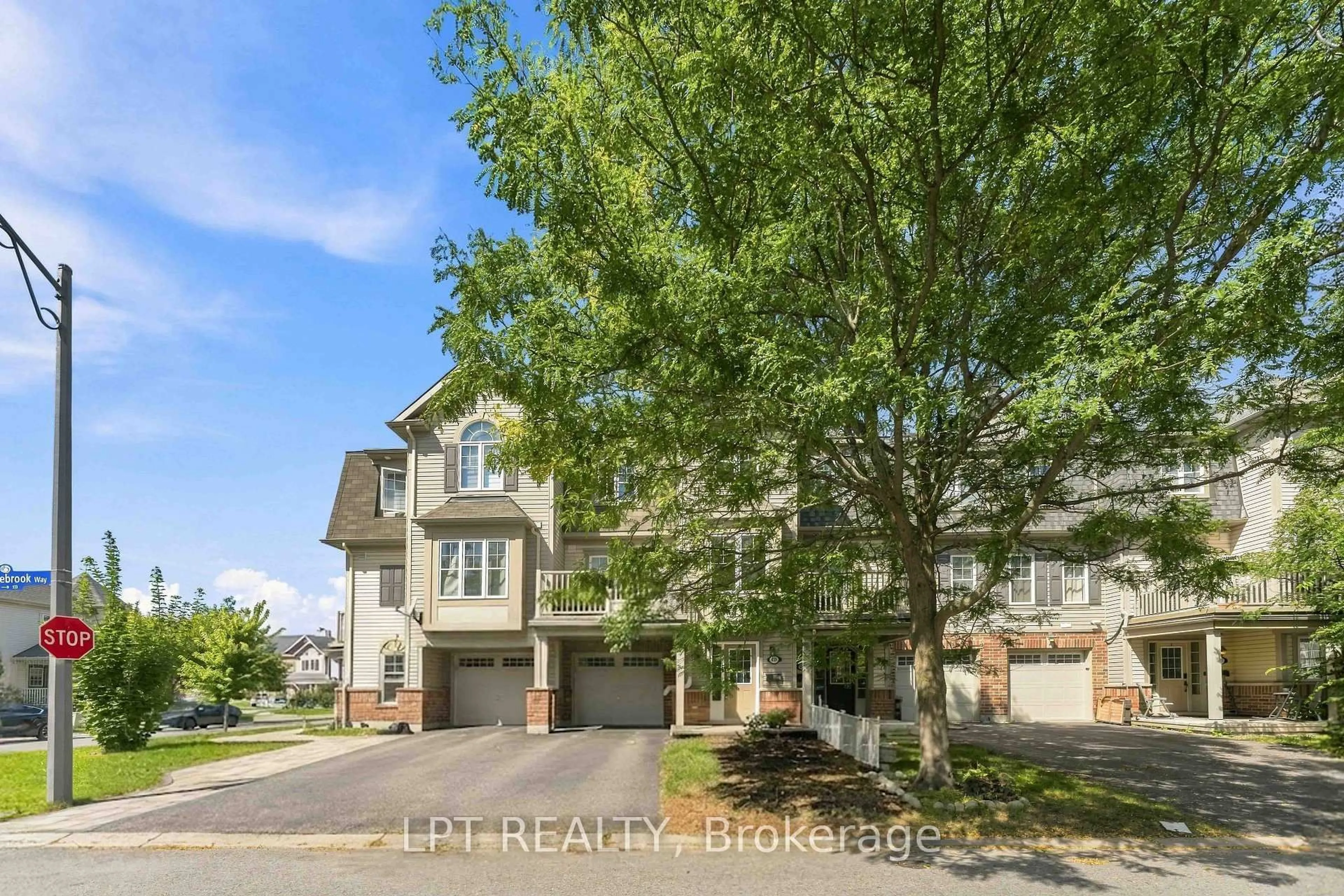 A pic from outside/outdoor area/front of a property/back of a property/a pic from drone, street for 503 Sedgebrook Way, Stittsville Ontario K2S 0M3