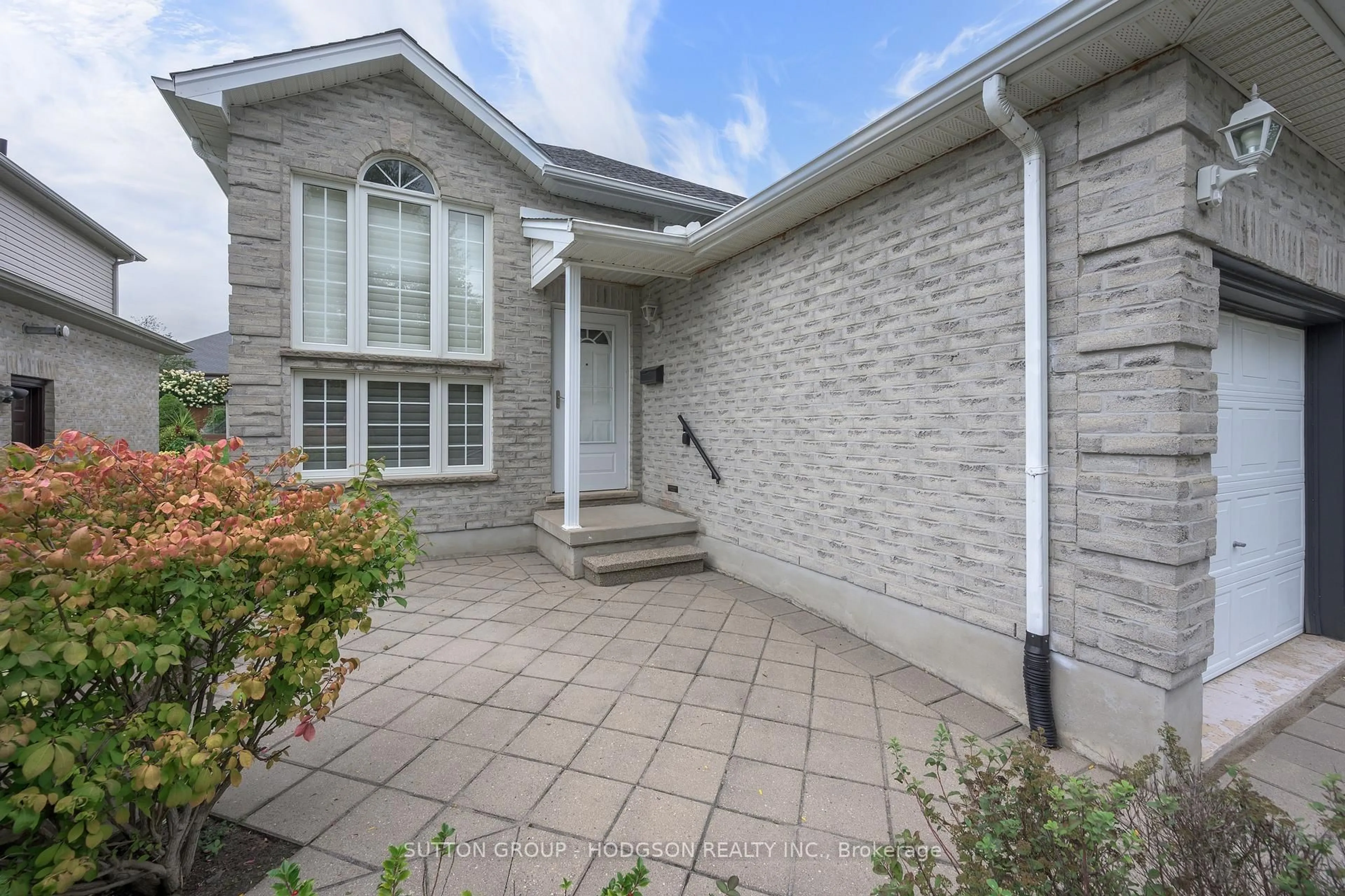 Home with brick exterior material, street for 703 Bramblewood Pl, London South Ontario N6K 4Y3