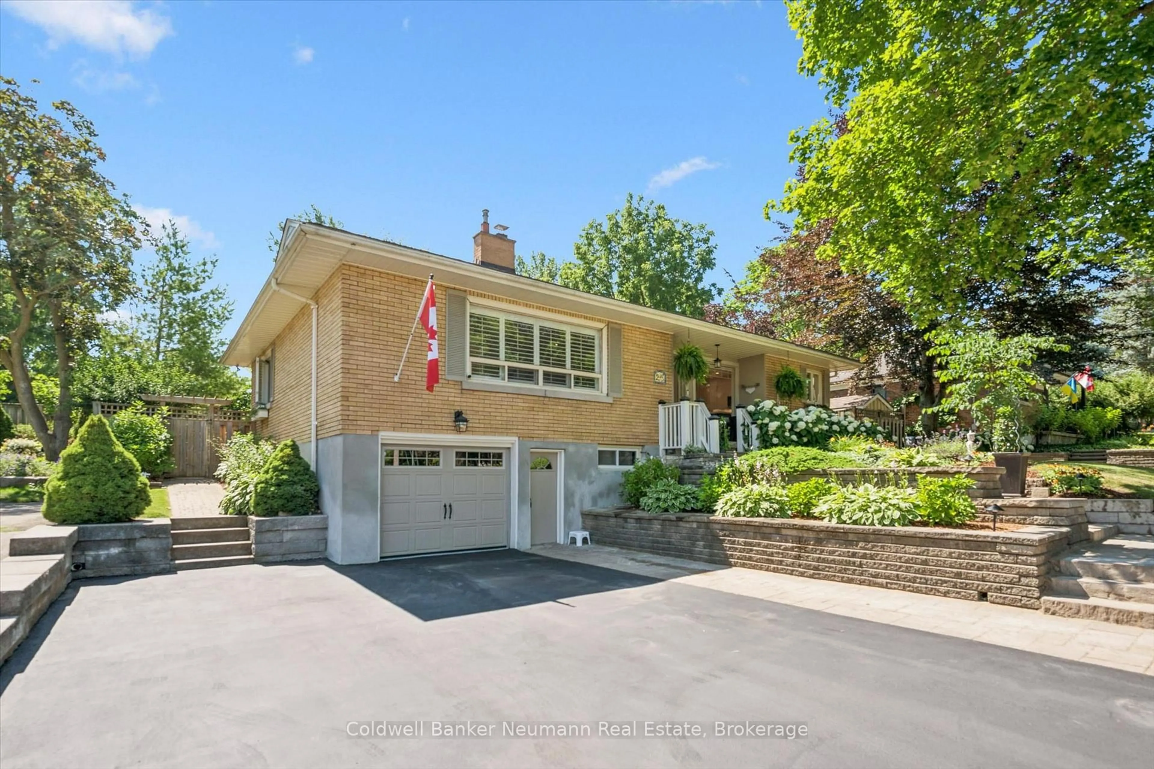 Home with brick exterior material, street for 25 Bennett Ave, Guelph Ontario N1E 2C6