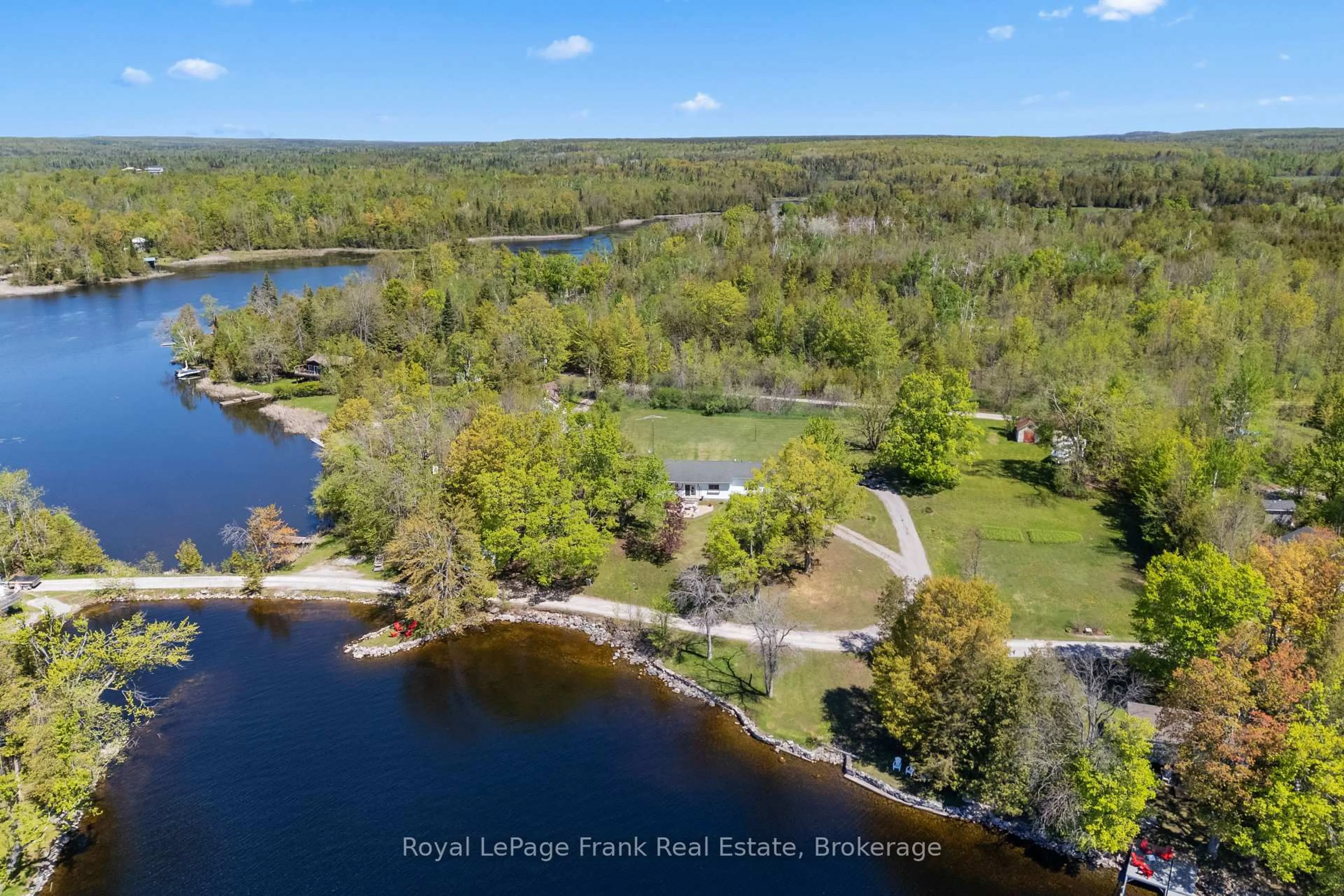 A pic from outside/outdoor area/front of a property/back of a property/a pic from drone, water/lake/river/ocean view for 39 Fire Route 98 Rte, Trent Lakes Ontario K0M 1A0