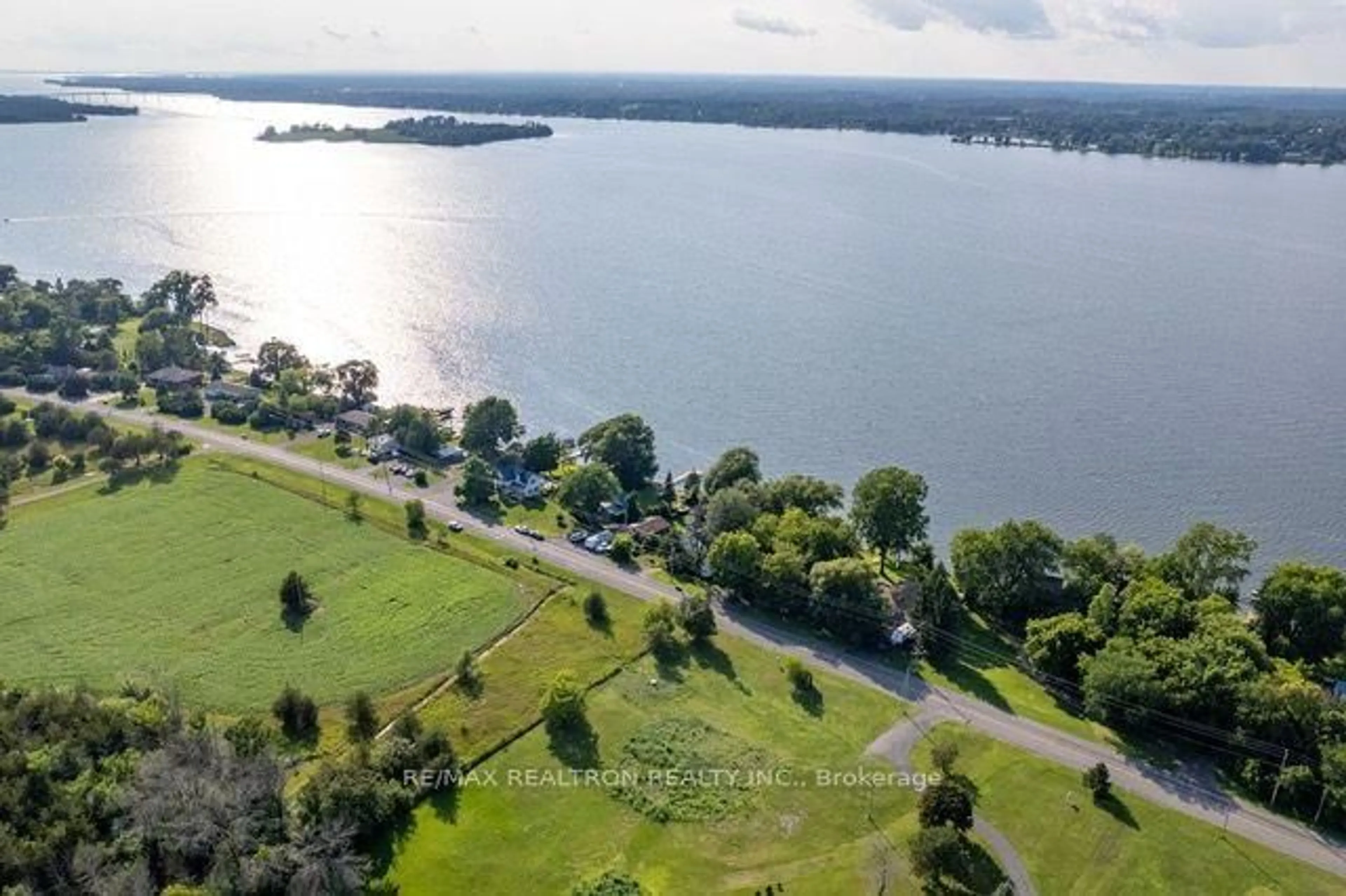 A pic from outside/outdoor area/front of a property/back of a property/a pic from drone, water/lake/river/ocean view for 2141 County Rd #9, Napanee Ontario K7R 3K8
