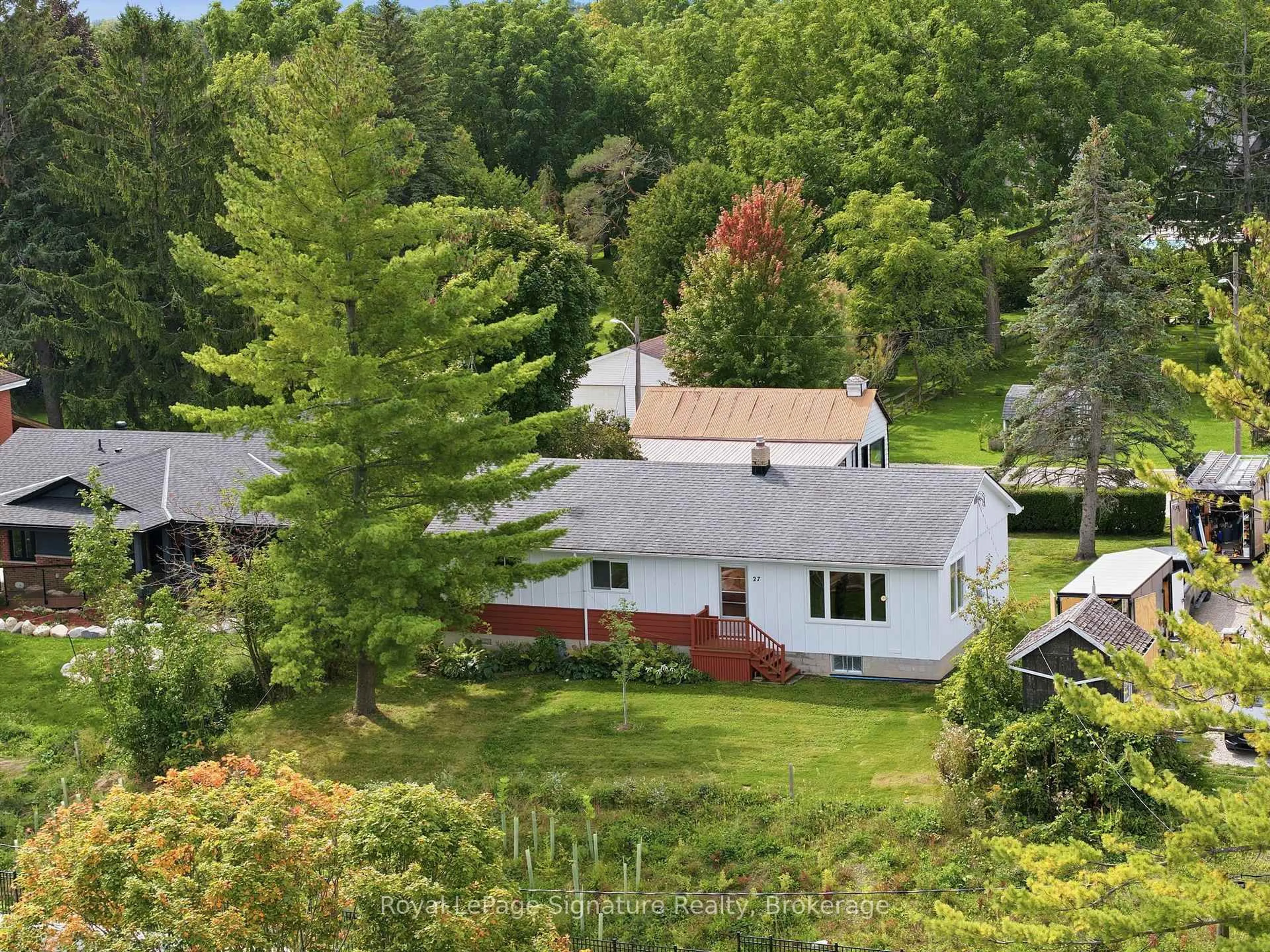A pic from outside/outdoor area/front of a property/back of a property/a pic from drone, forest/trees view for 27 Louisa St, Blue Mountains Ontario N0H 2P0