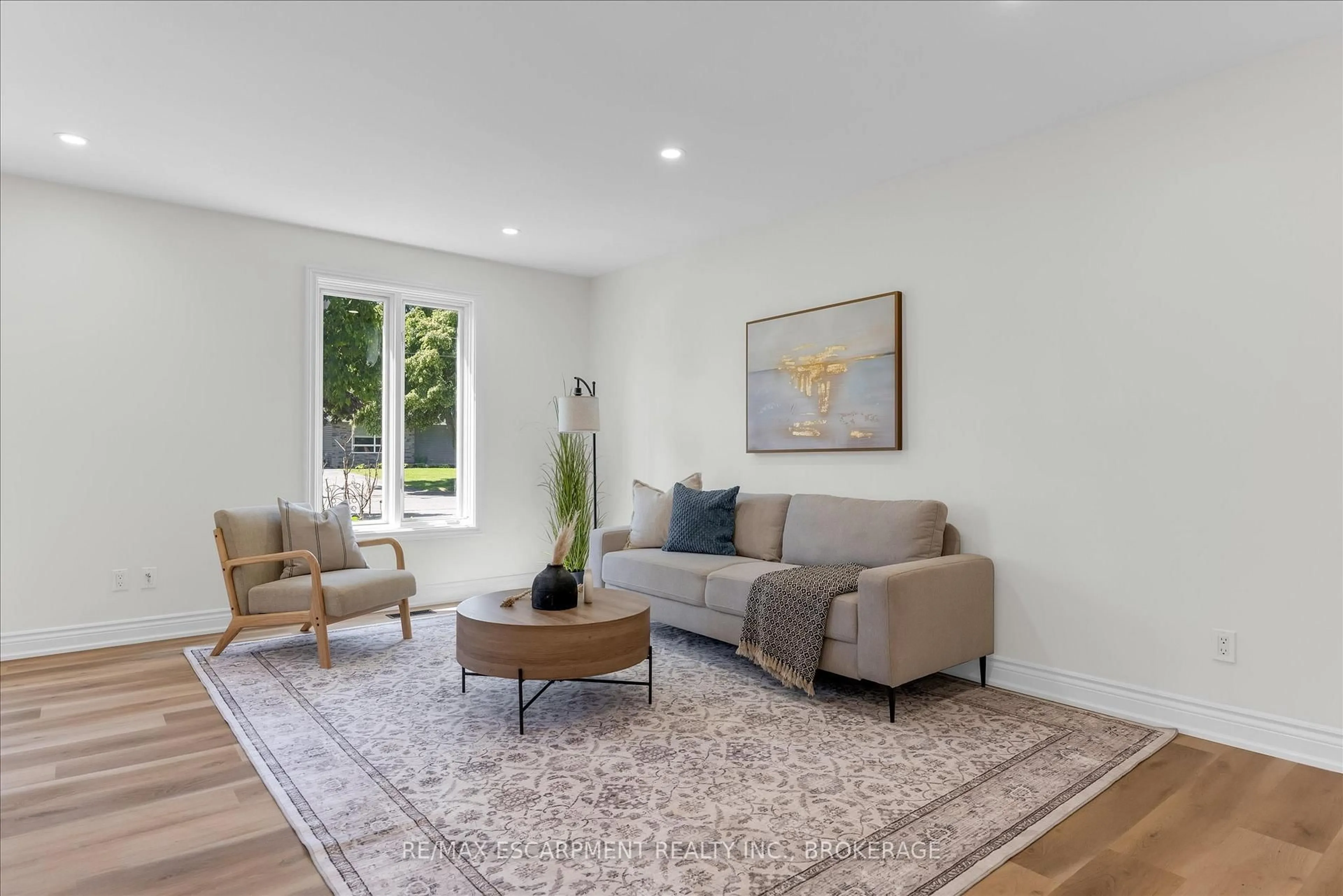 Living room with furniture, unknown for 49 Grove Ave, St. Catharines Ontario L2P 1C9