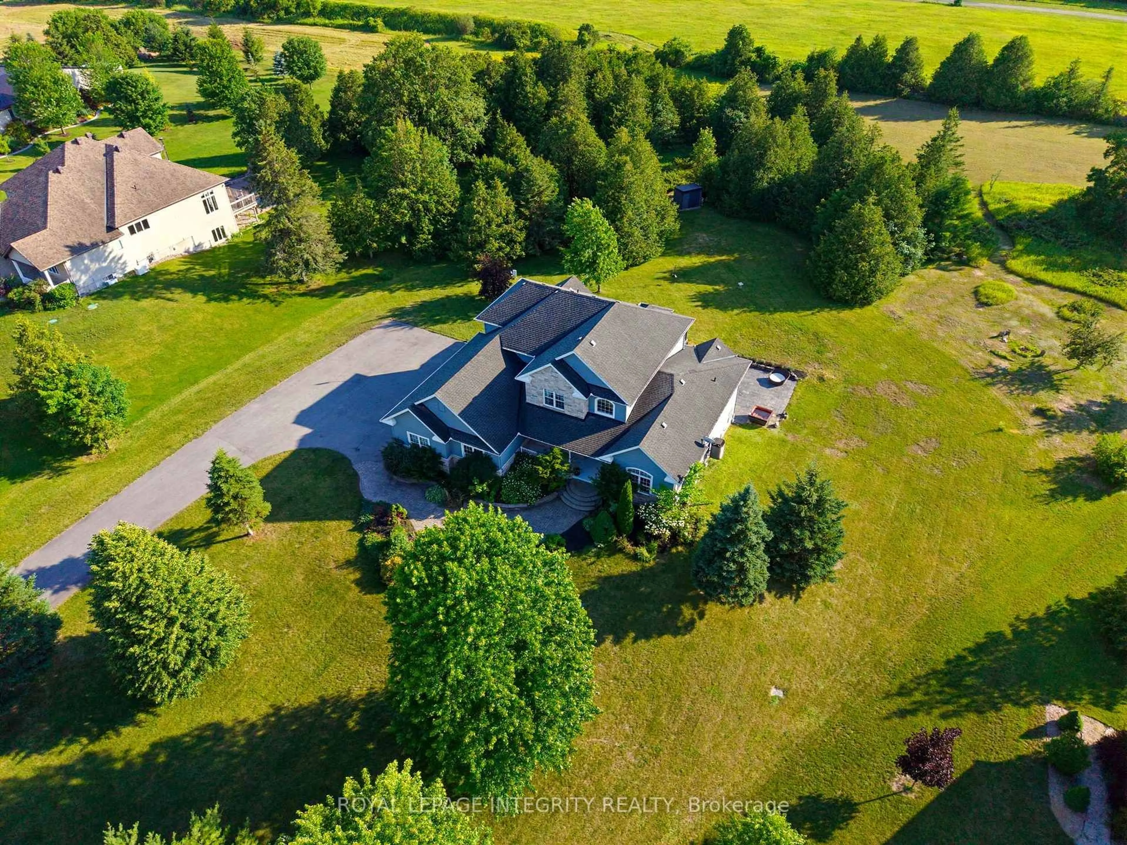 A pic from outside/outdoor area/front of a property/back of a property/a pic from drone, unknown for 562 Pennycross Lane, Carp Ontario K0A 1L0
