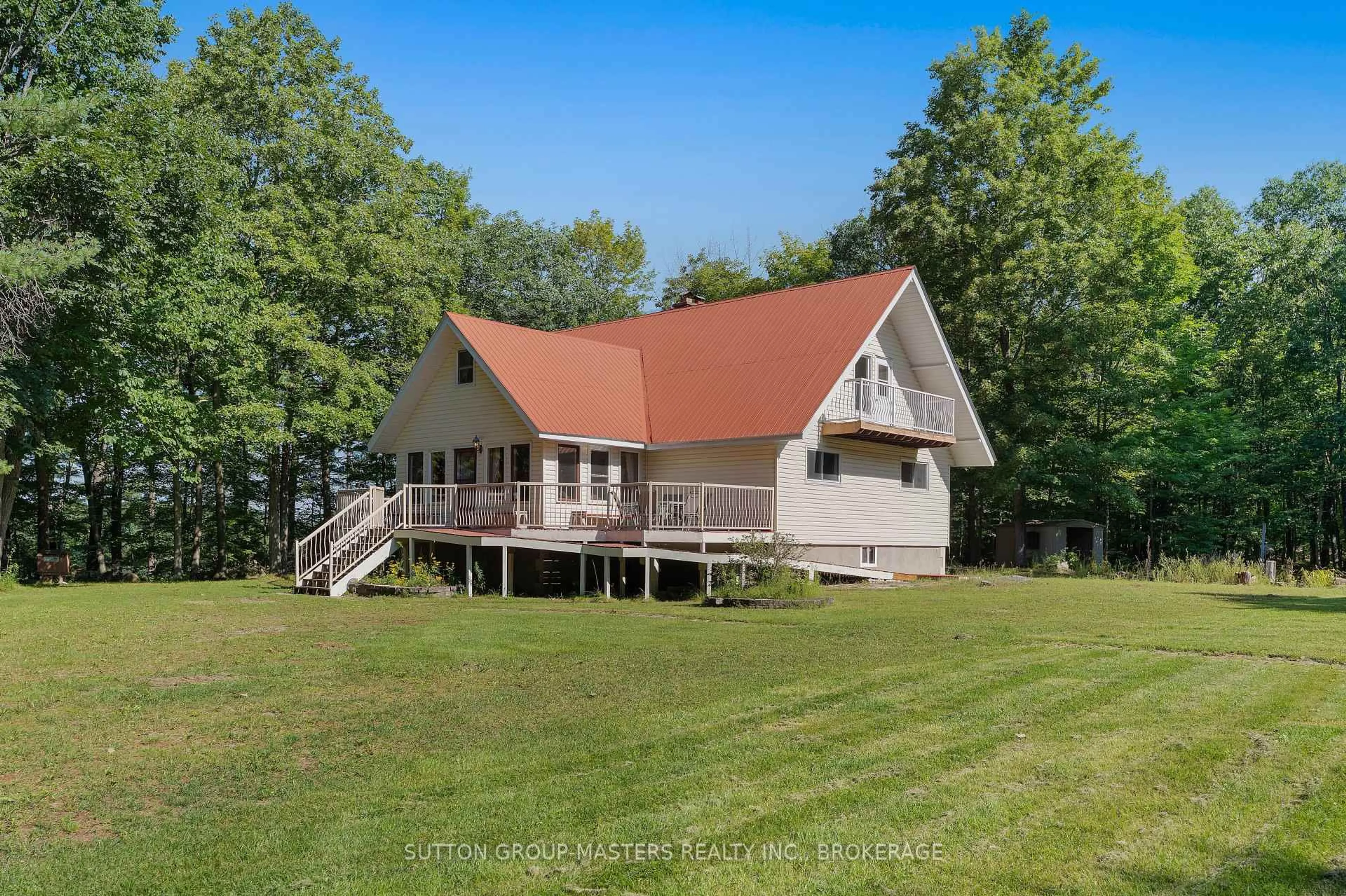 A pic from outside/outdoor area/front of a property/back of a property/a pic from drone, water/lake/river/ocean view for 3659 Moore Farm Lane, Hartington Ontario K0H 1W0