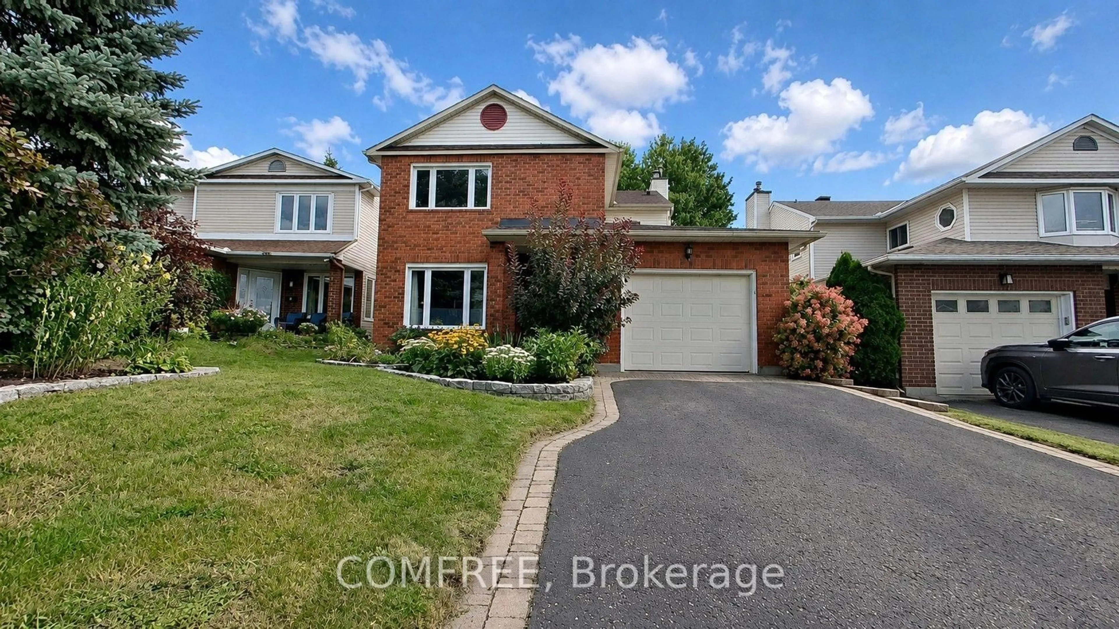 Home with brick exterior material, street for 1302 Parc Du Village St, Orleans Ontario K1C 7B1