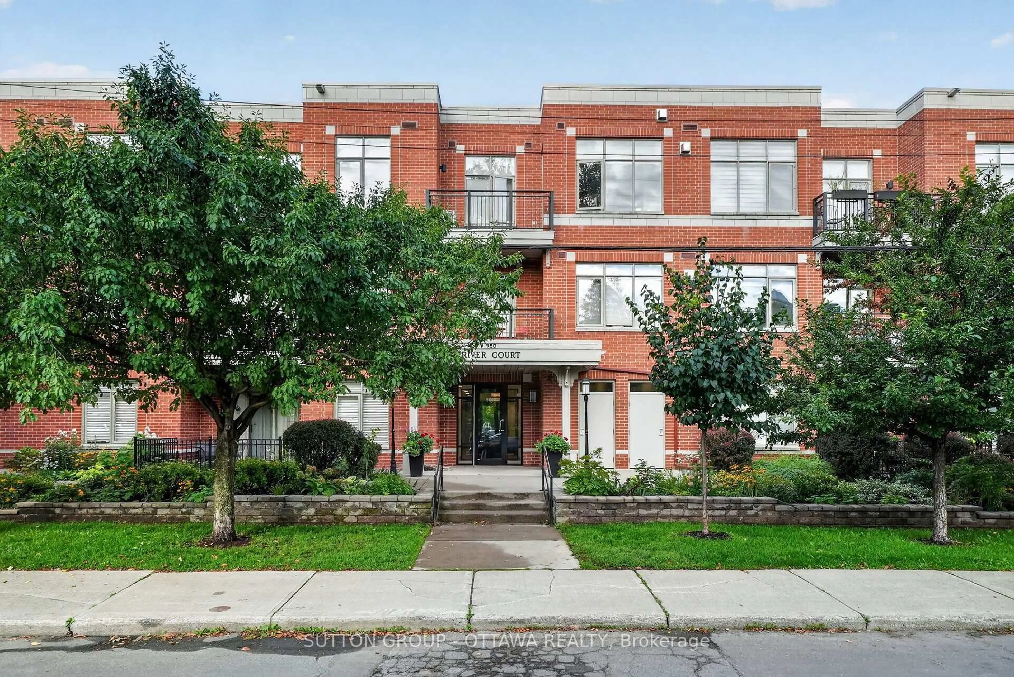 Home with brick exterior material, street for 950 MARGUERITE Ave #103, Ottawa Ontario K1K 3T8