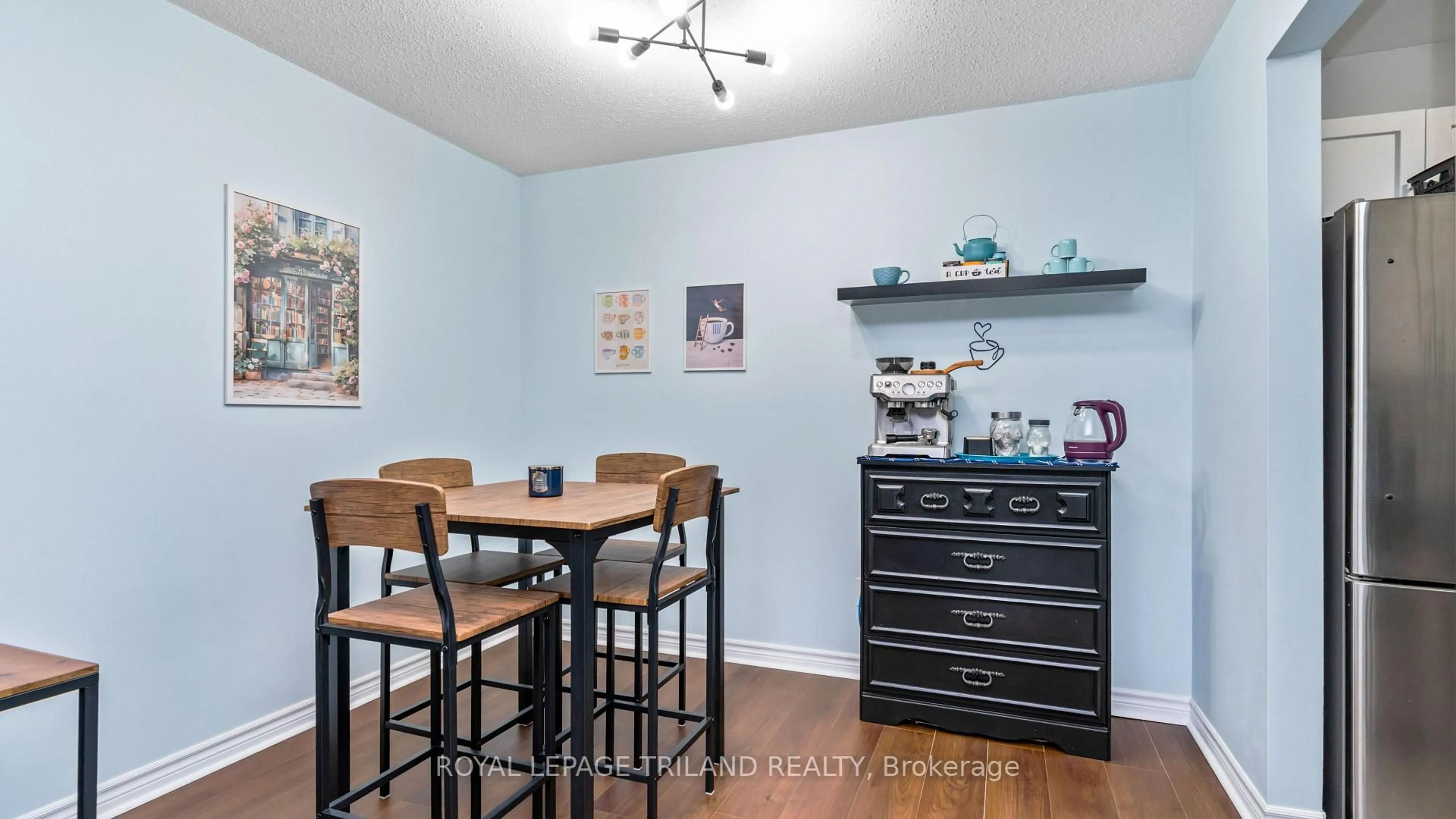 Dining room, wood/laminate floor for 735 DEVERON Cres #116, London South Ontario N5Z 4X8