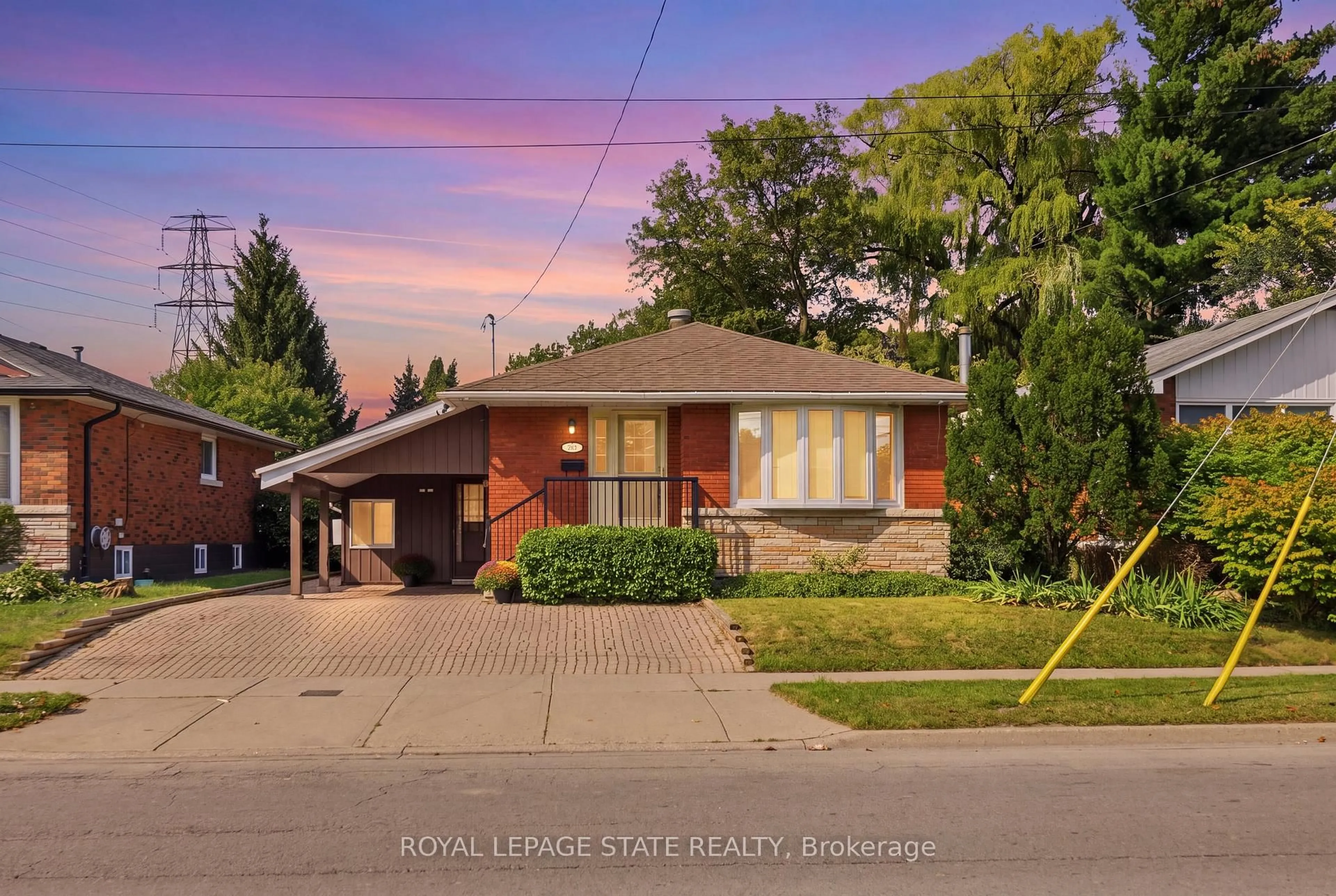 Home with brick exterior material, street for 304 Whitney Ave, Hamilton Ontario L8S 2H2
