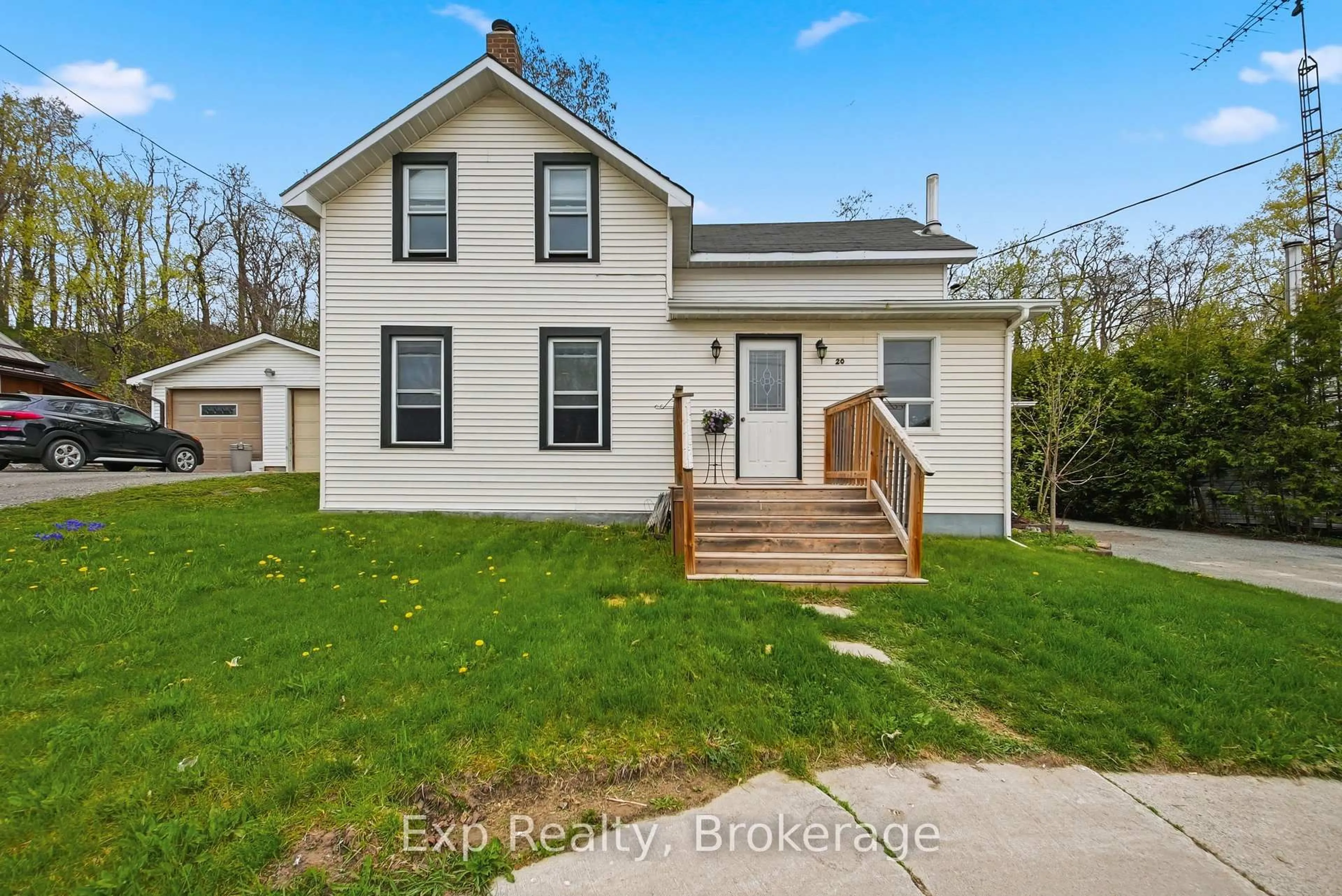 A pic from outside/outdoor area/front of a property/back of a property/a pic from drone, street for 20 Main St, Limoges Ontario K0K 2M0
