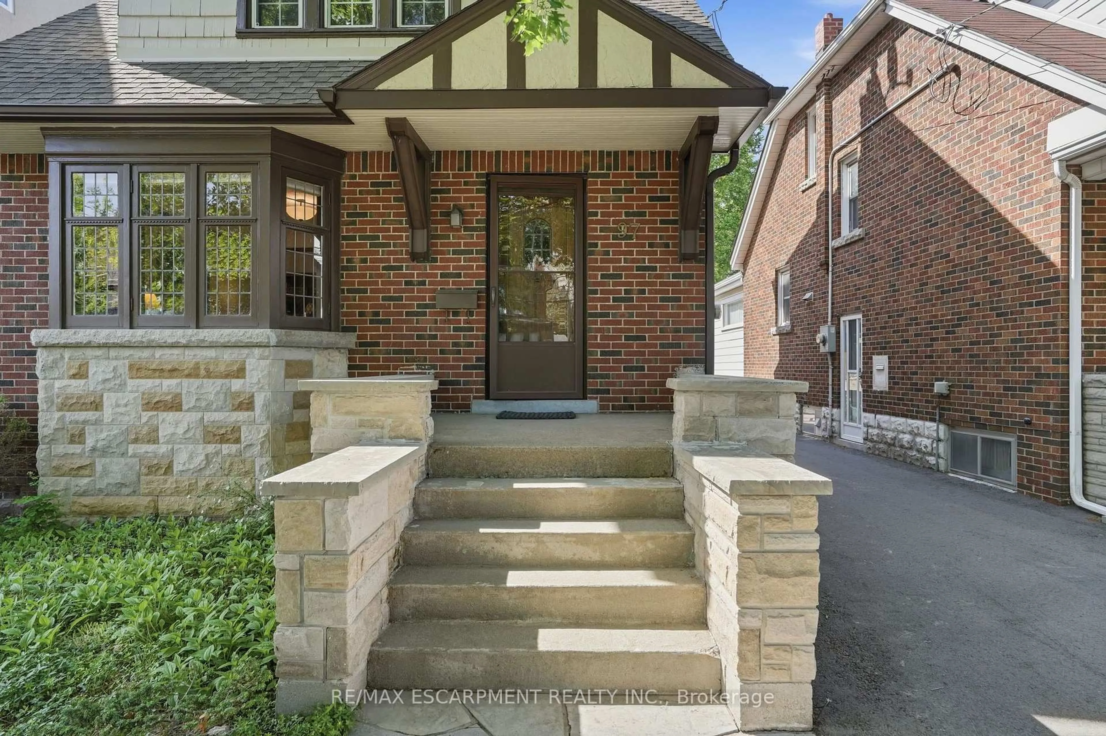 Home with brick exterior material, street for 97 Cline Ave, Hamilton Ontario L8S 3Z5