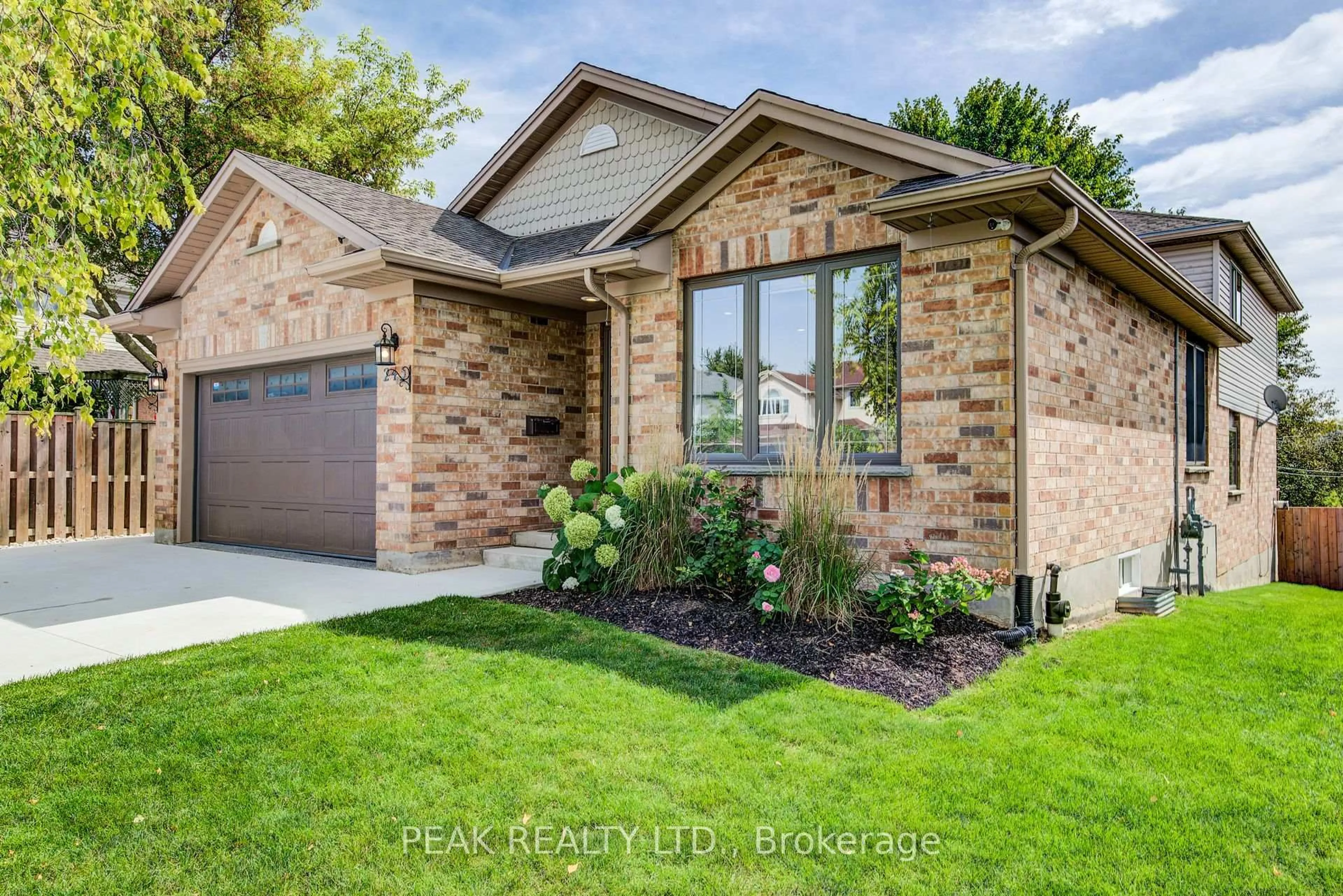 Home with brick exterior material, street for 245 Schneller Dr, Wilmot Ontario N3A 2K9