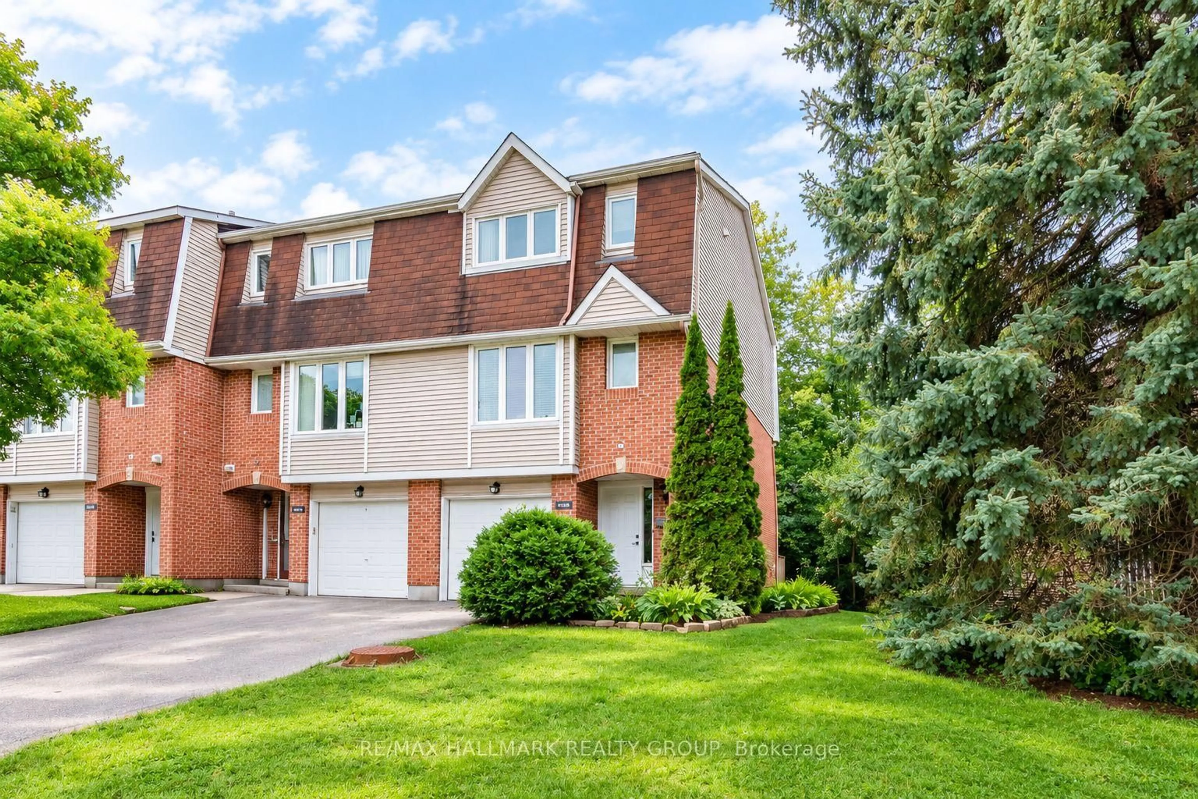 Home with brick exterior material, street for 409 Pickford Dr #B, Ottawa Ontario K2L 3P8