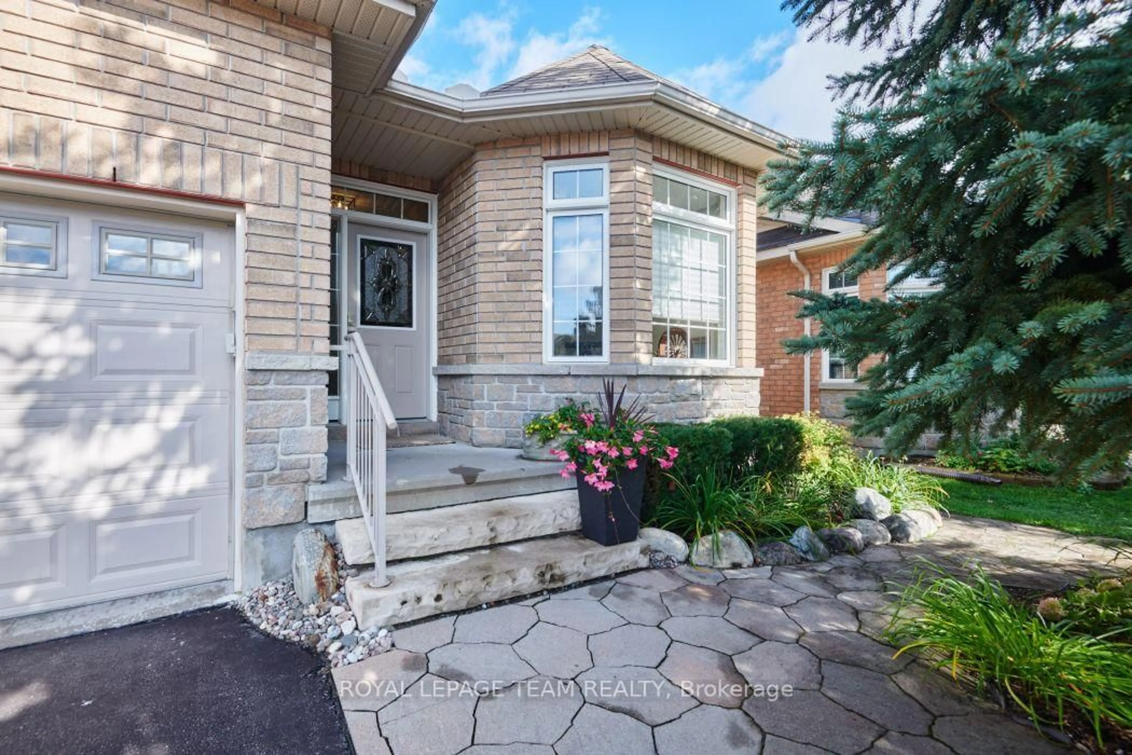 Home with brick exterior material, street for 934 Burwash Landing Way, Kanata Ontario K2W 0C8