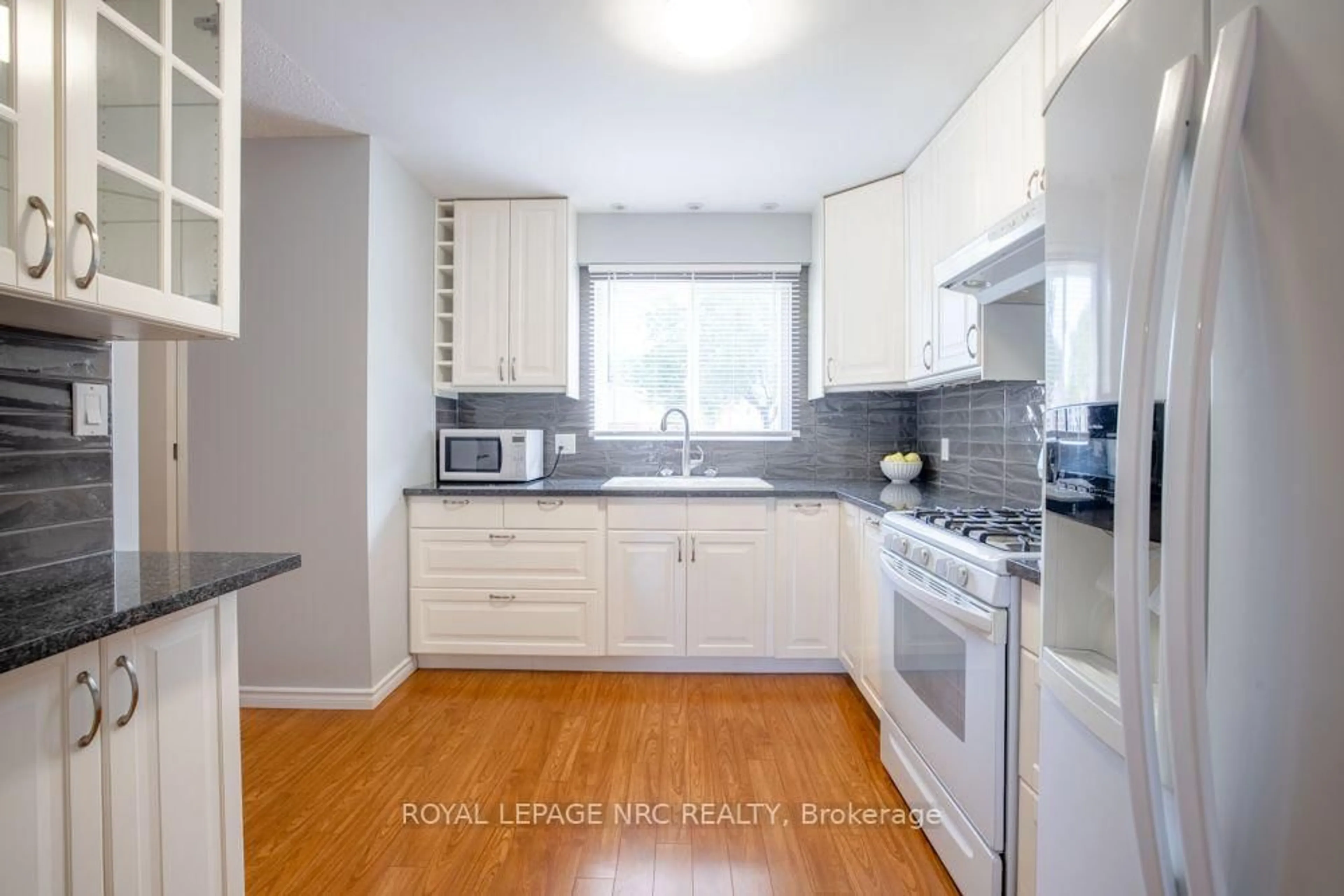 Standard kitchen, wood/laminate floor for 65 Dorchester Blvd #48, St. Catharines Ontario L2M 7T7
