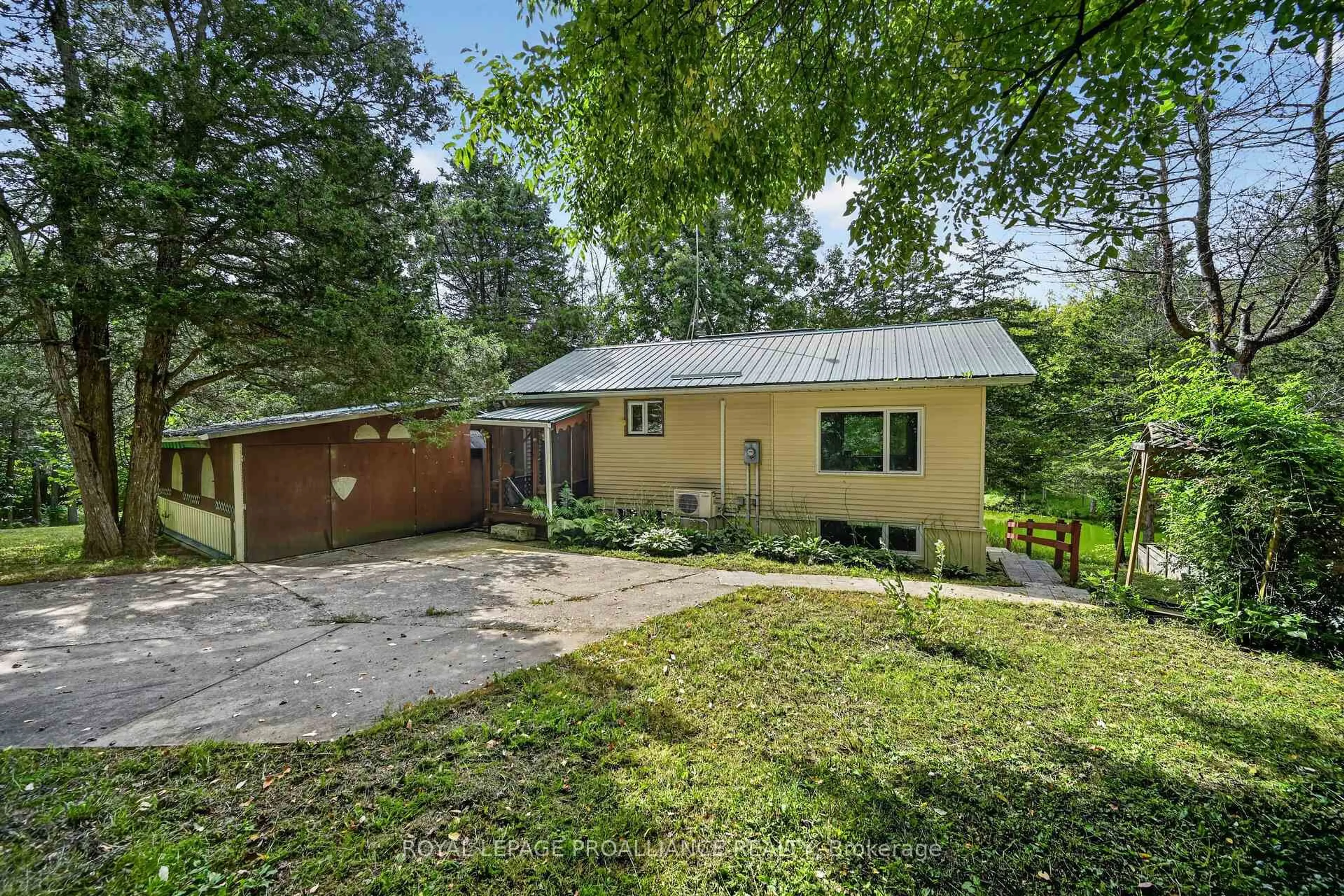 A pic from outside/outdoor area/front of a property/back of a property/a pic from drone, unknown for 100 Coons Rd, Rideau Lakes Ontario K0G 1E0