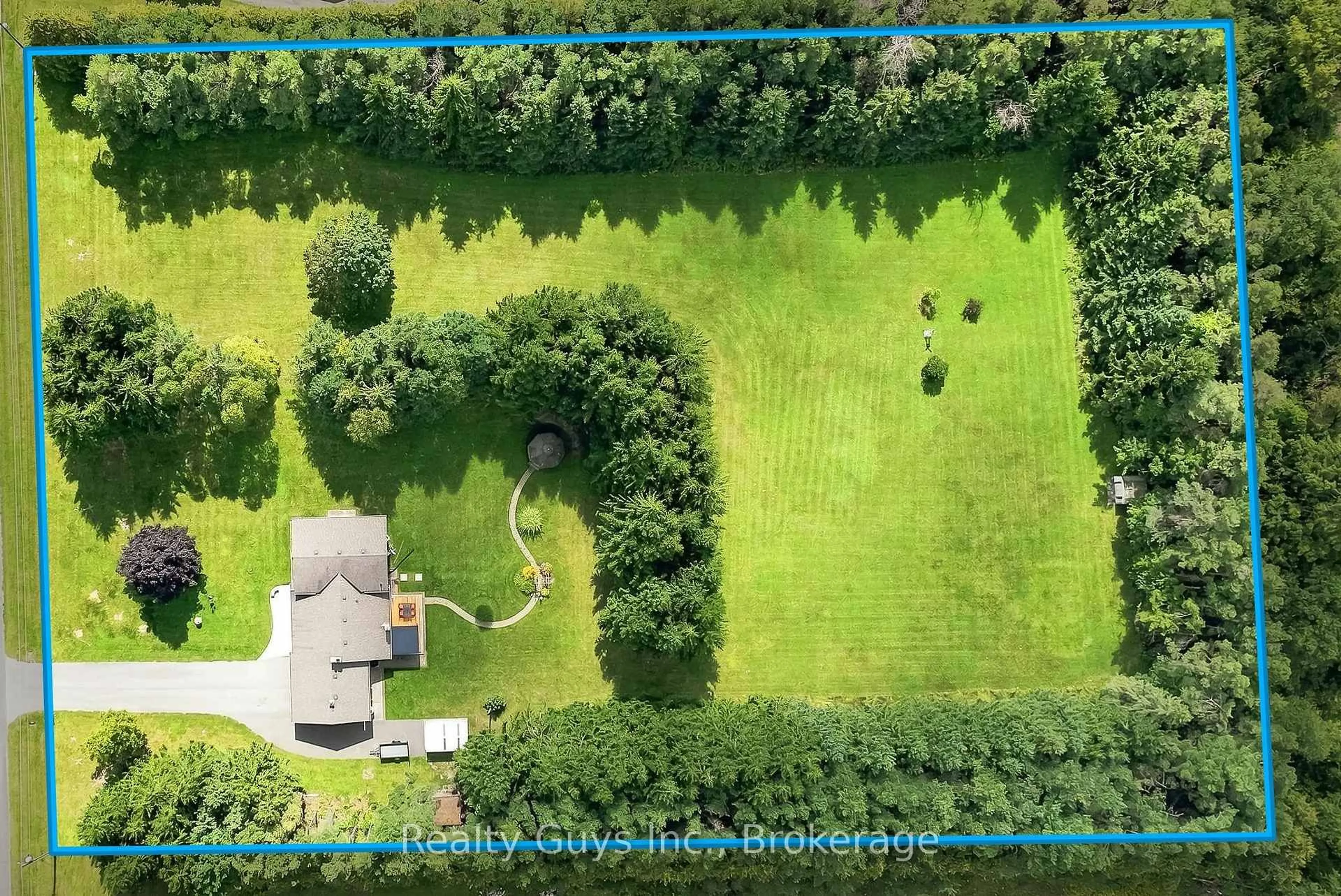 A pic from outside/outdoor area/front of a property/back of a property/a pic from drone, forest/trees view for 498 Ava Cres, Cavan Monaghan Ontario L0A 1G0