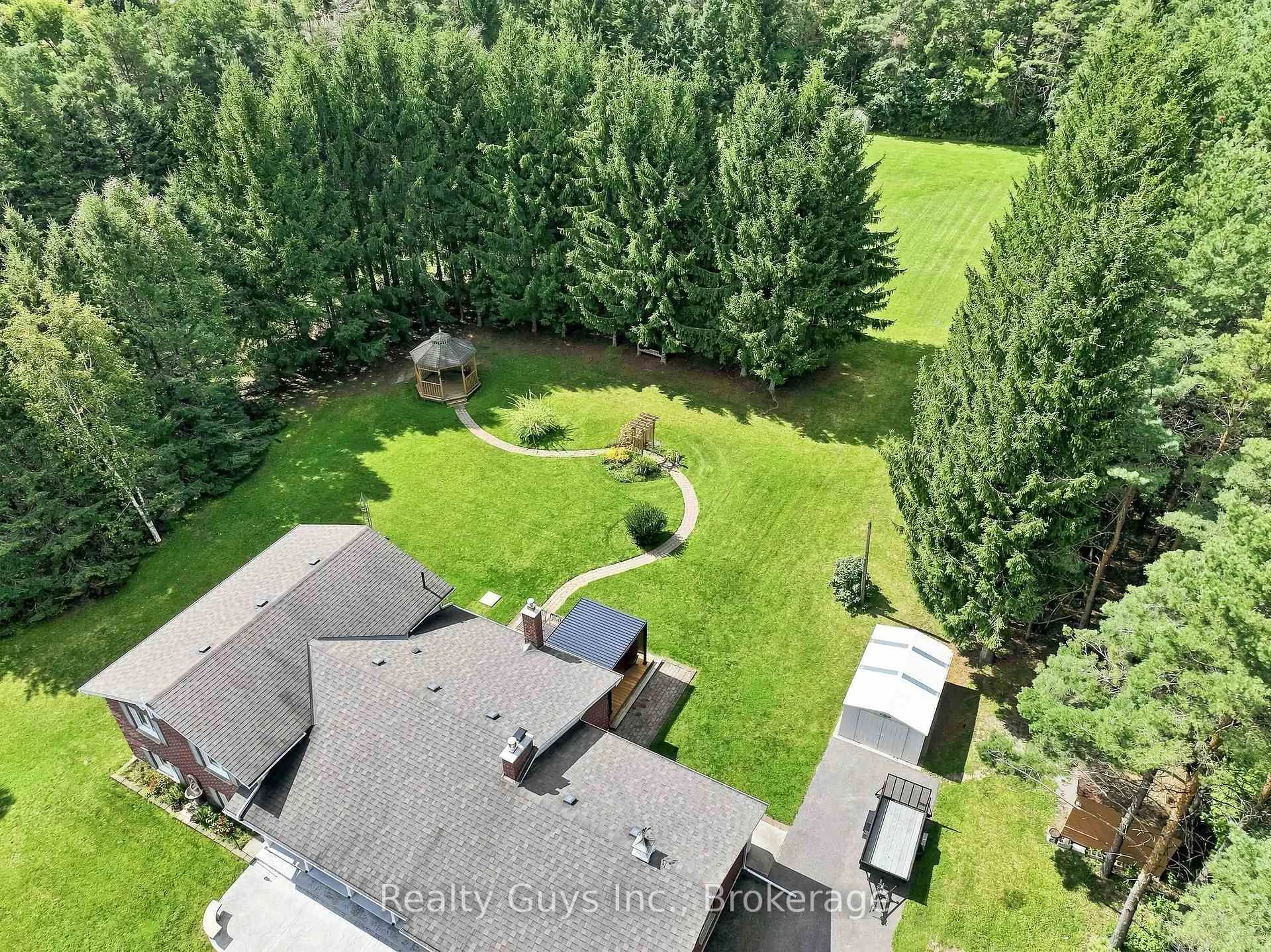 A pic from outside/outdoor area/front of a property/back of a property/a pic from drone, forest/trees view for 498 Ava Cres, Cavan Monaghan Ontario L0A 1G0