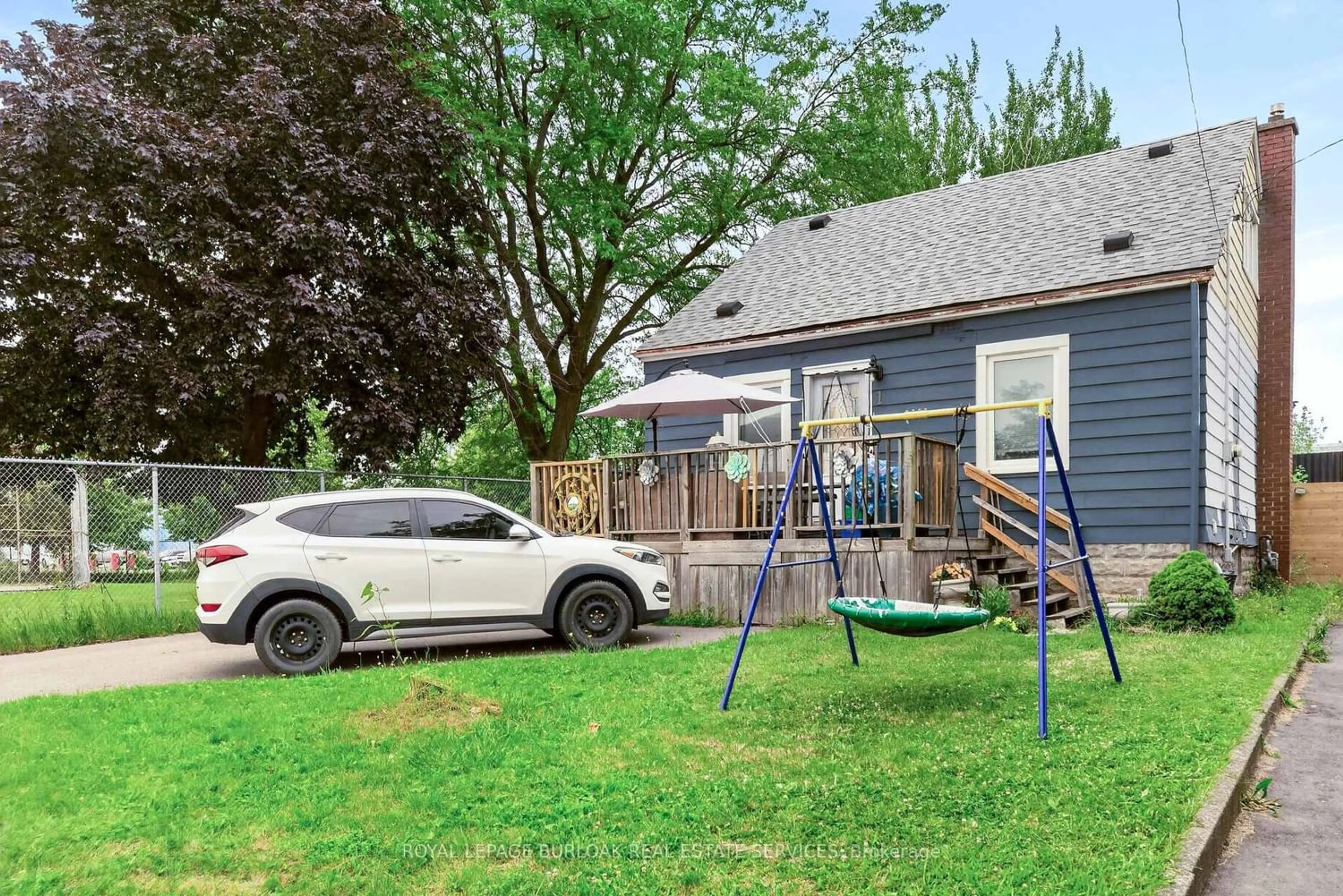 Home with vinyl exterior material, street for 1 Mahony Ave, Hamilton Ontario L8H 3C3