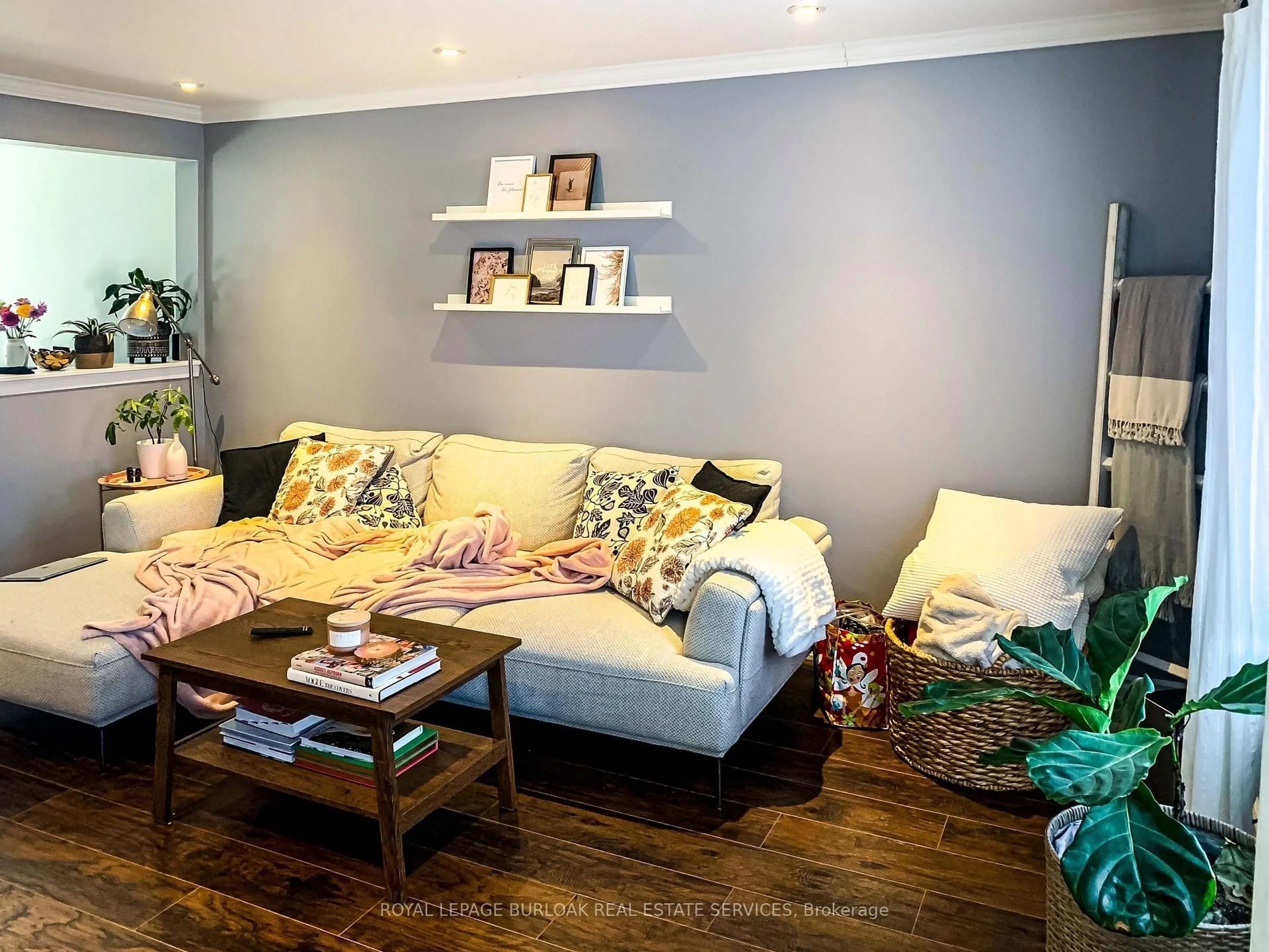 Living room with furniture, wood/laminate floor for 1 Mahony Ave, Hamilton Ontario L8H 3C3