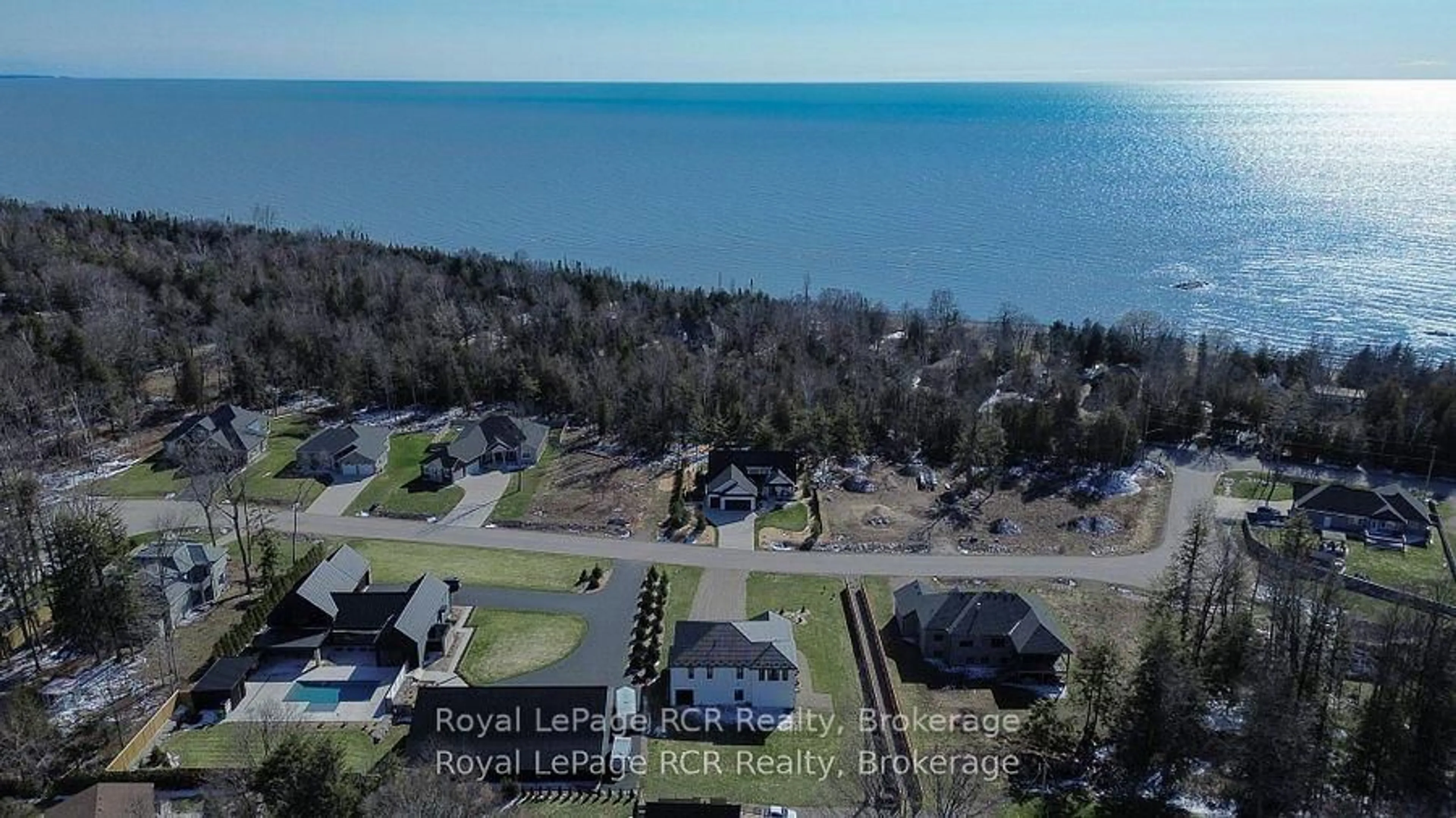 A pic from outside/outdoor area/front of a property/back of a property/a pic from drone, water/lake/river/ocean view for 9 Sunset Pl, Huron-Kinloss Ontario N0G 2R0