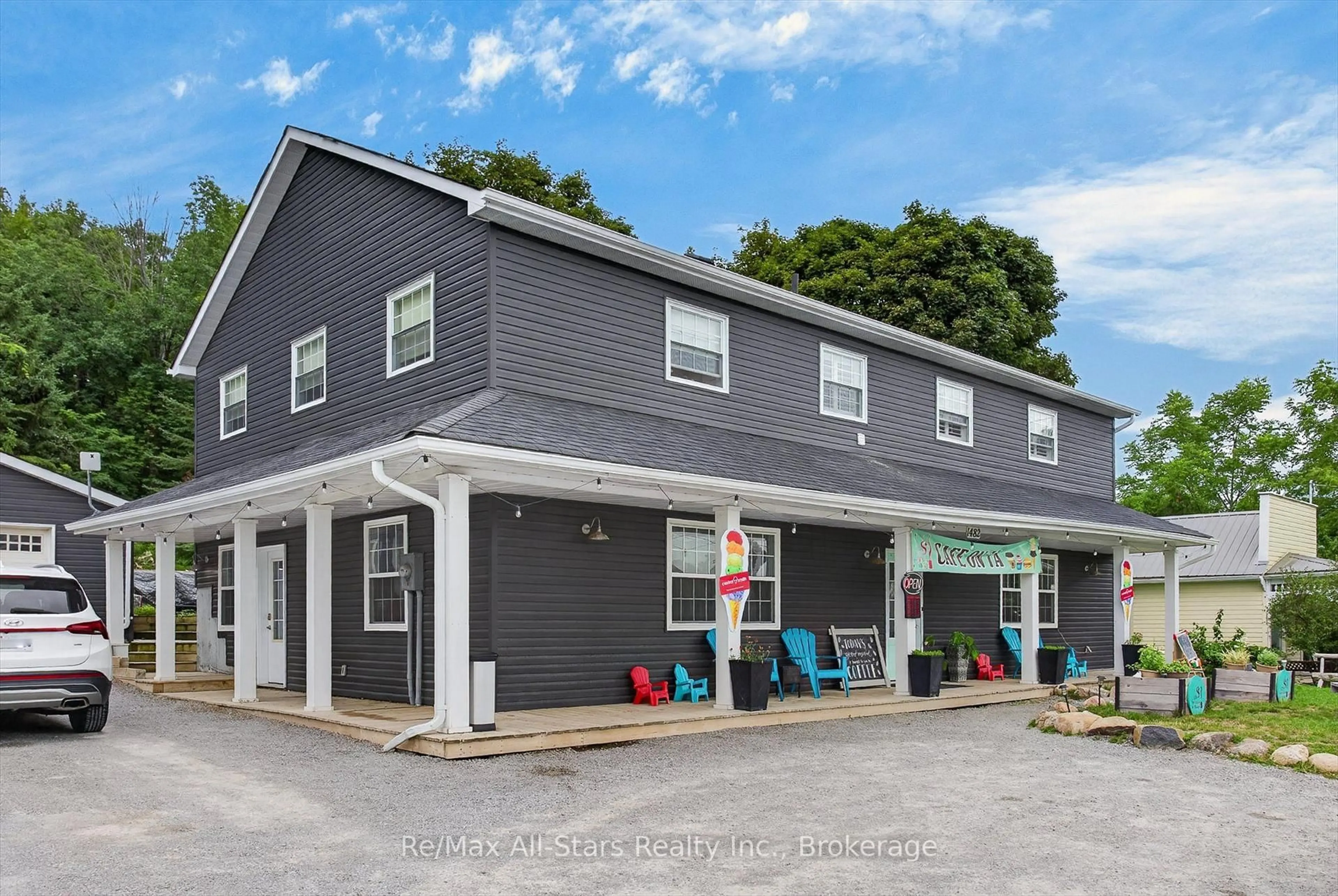 Home with vinyl exterior material, street for 1482 Highway 7A, Kawartha Lakes Ontario L0A 1A0