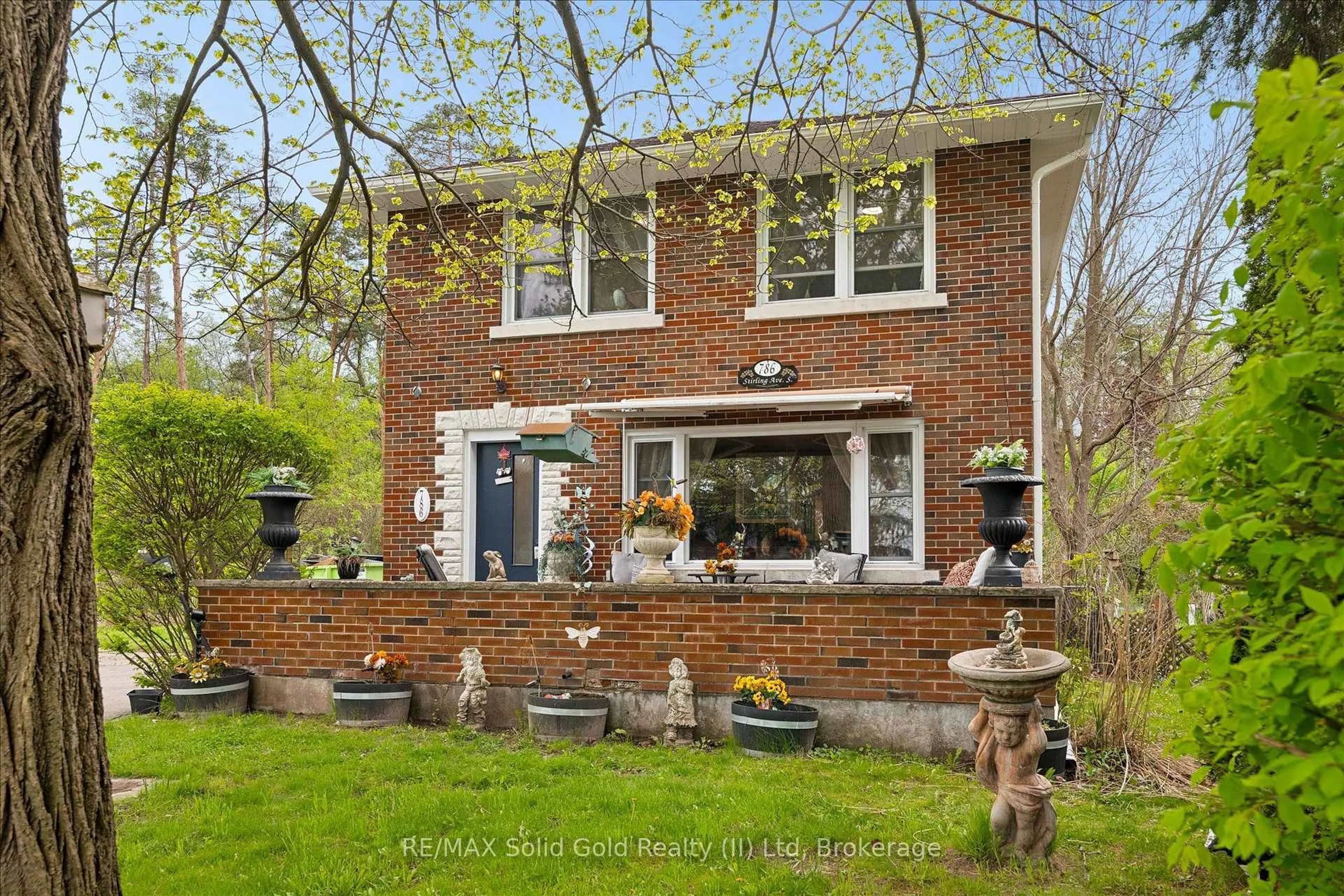 Home with brick exterior material, street for 786 Stirling Ave, Kitchener Ontario N2M 3K3