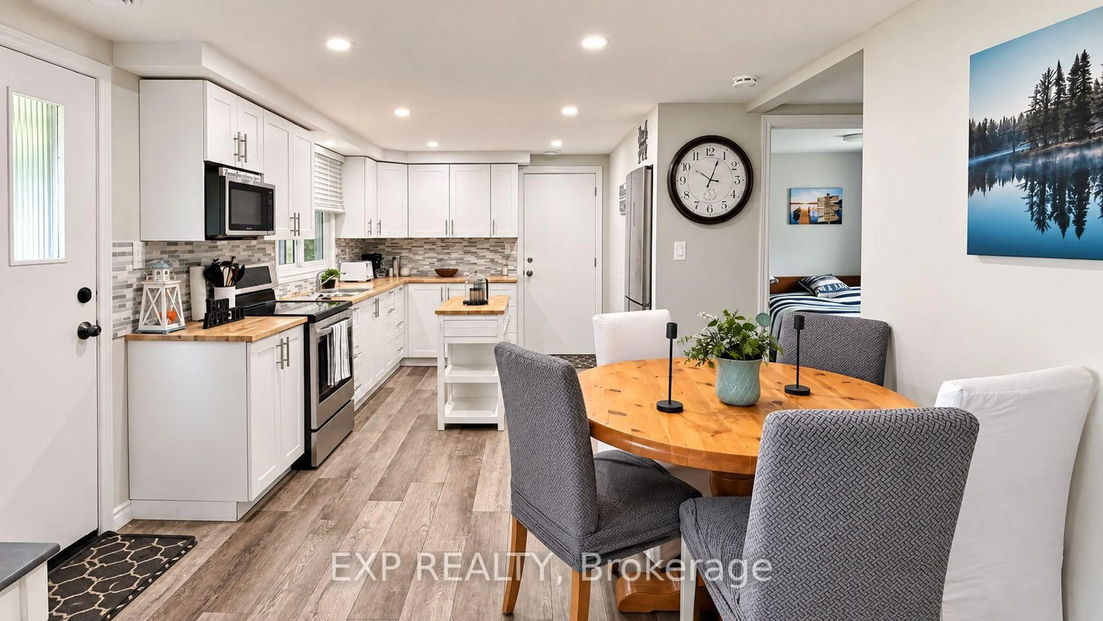 Open concept kitchen, wood/laminate floor for 9 Charlotte Cres, Kawartha Lakes Ontario K0L 2W0