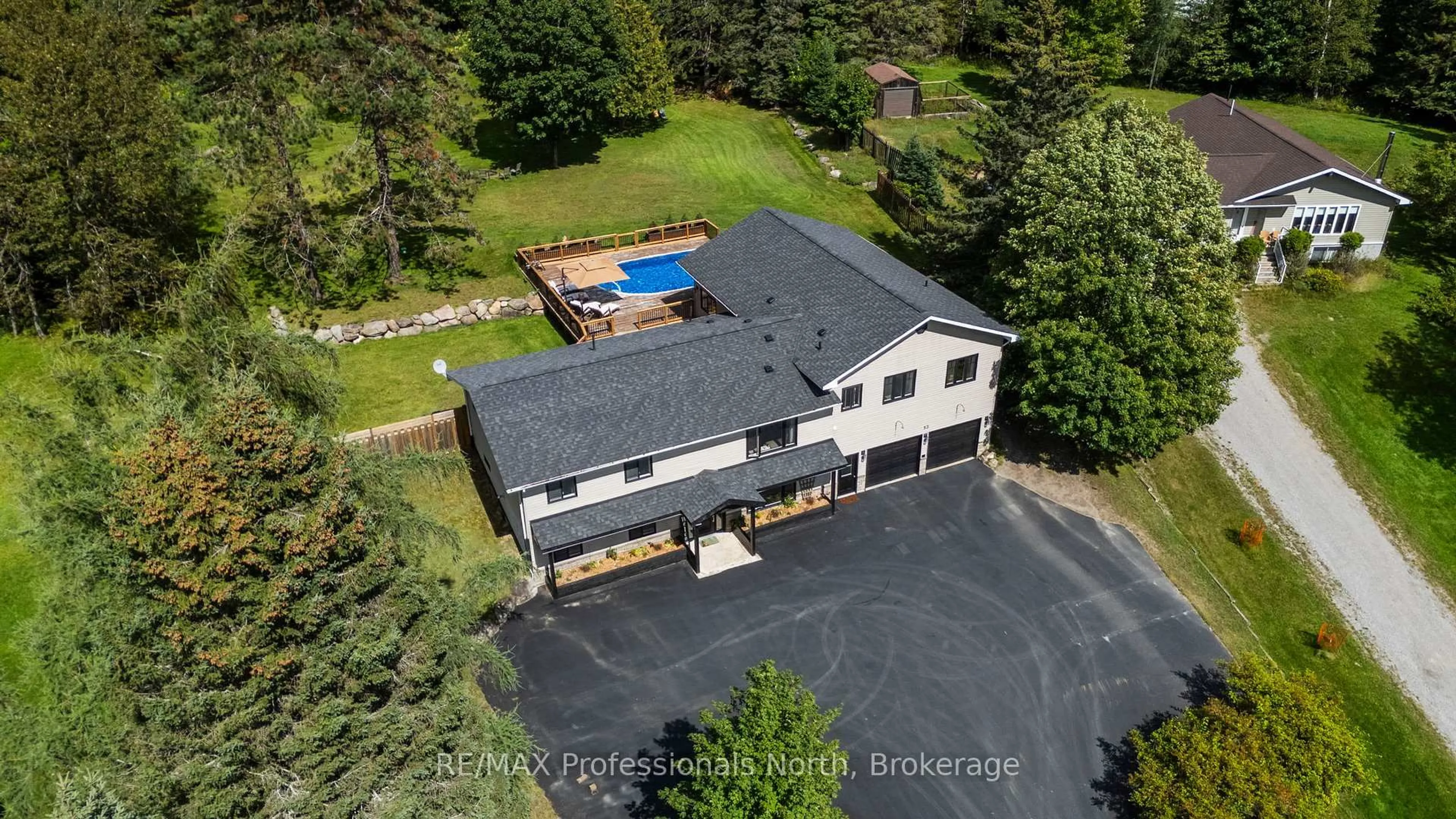 A pic from outside/outdoor area/front of a property/back of a property/a pic from drone, unknown for 53 Harmony Rd, Dysart et al Ontario K0M 1S0