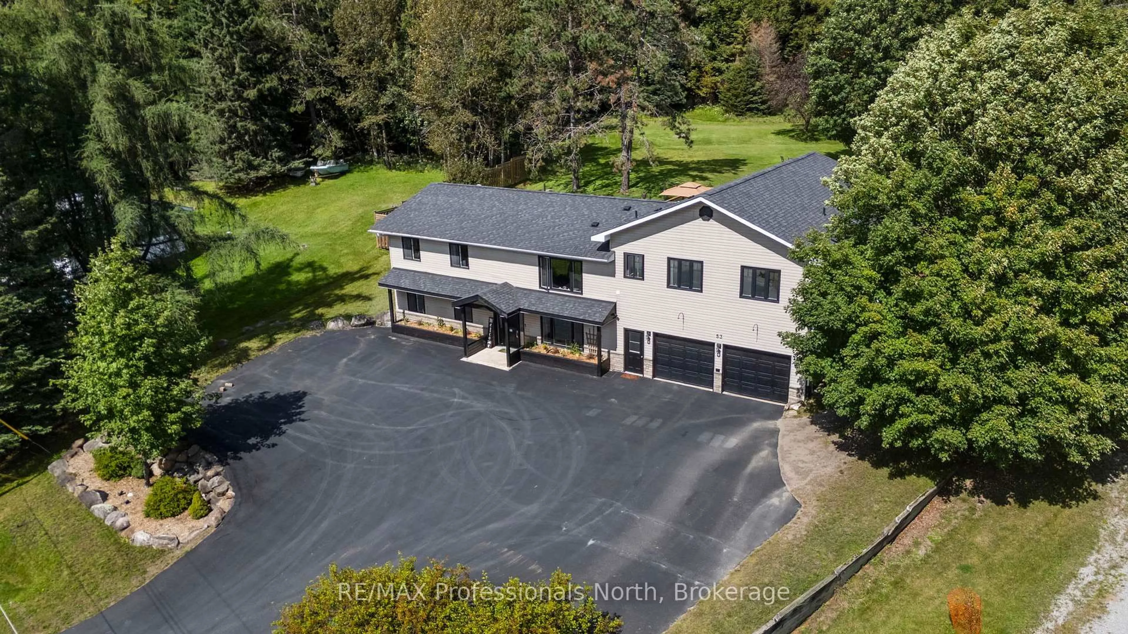 A pic from outside/outdoor area/front of a property/back of a property/a pic from drone, unknown for 53 Harmony Rd, Dysart et al Ontario K0M 1S0