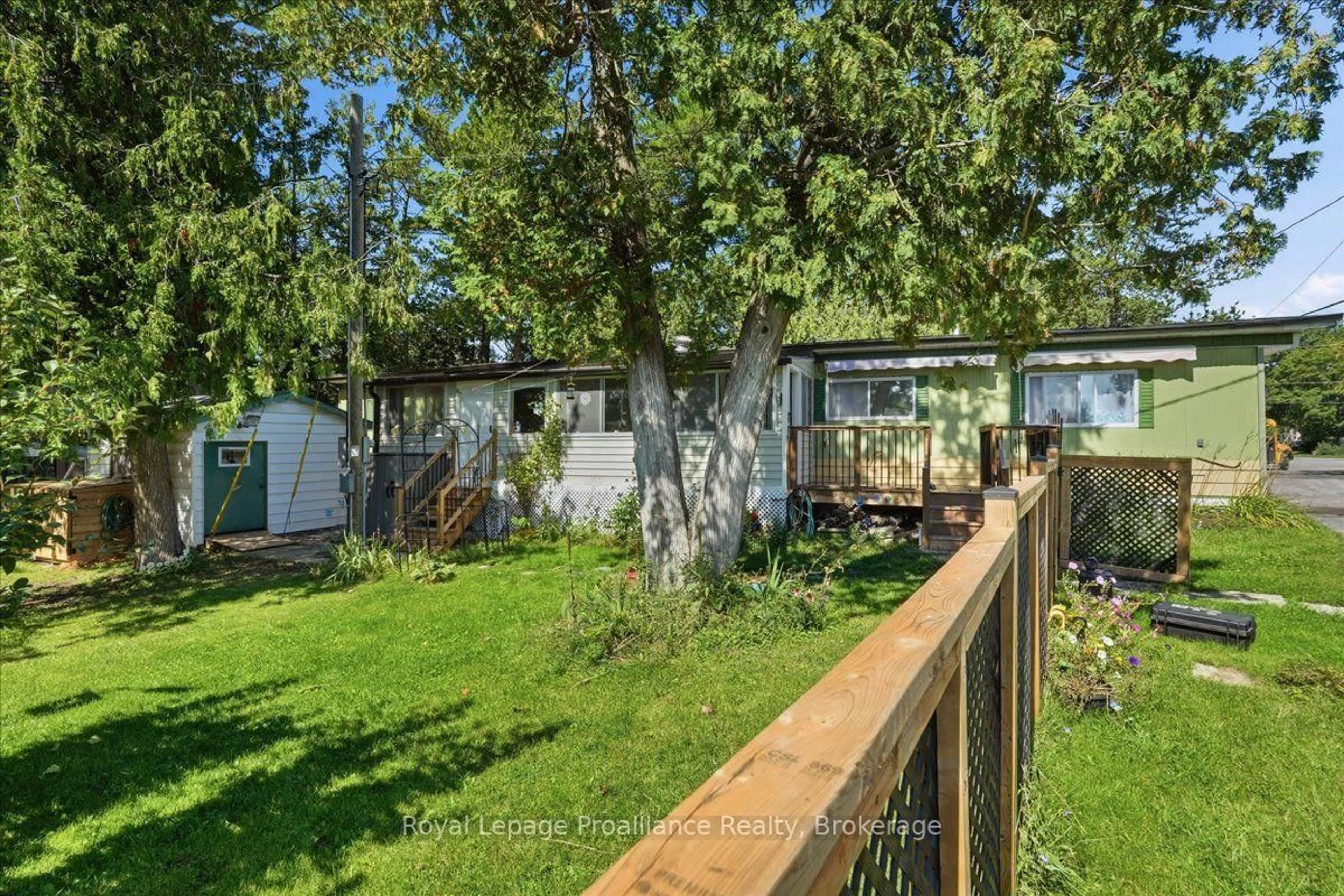 A pic from outside/outdoor area/front of a property/back of a property/a pic from drone, street for 5569 Bath Rd #22, Bath Ontario K0H 1G0