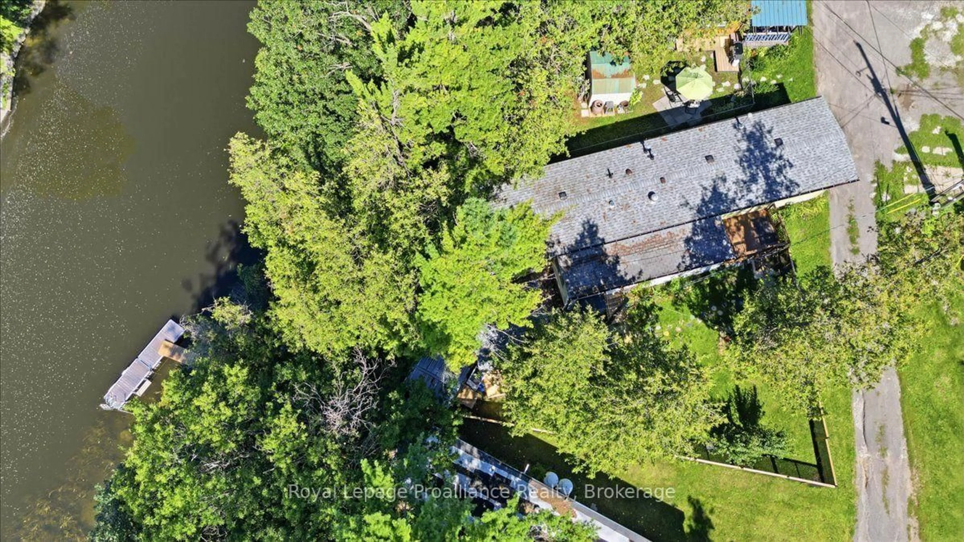 A pic from outside/outdoor area/front of a property/back of a property/a pic from drone, water/lake/river/ocean view for 5569 Bath Rd #22, Bath Ontario K0H 1G0