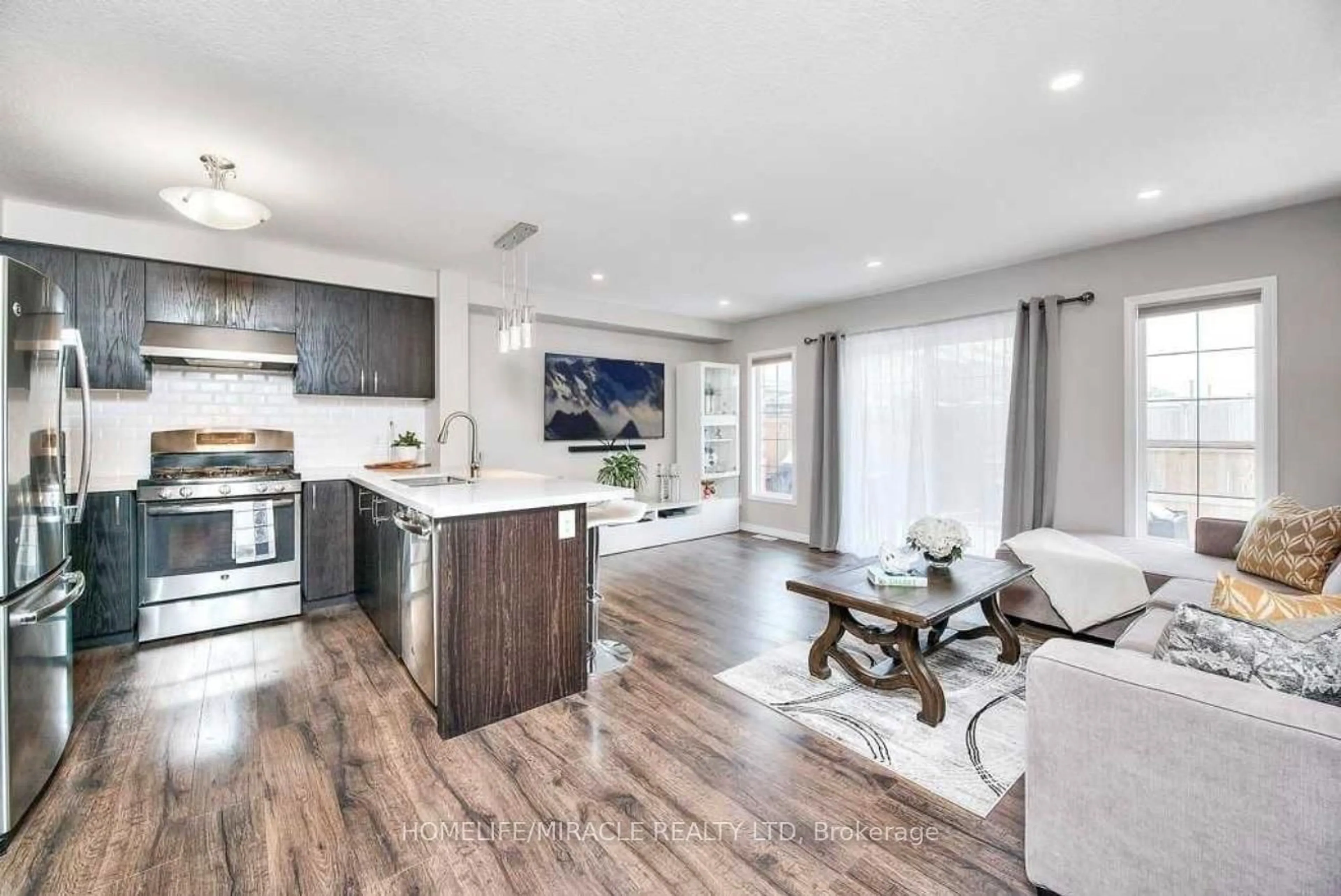 Open concept kitchen, wood/laminate floor for 132 Maitland St, Kitchener Ontario N2R 0C2